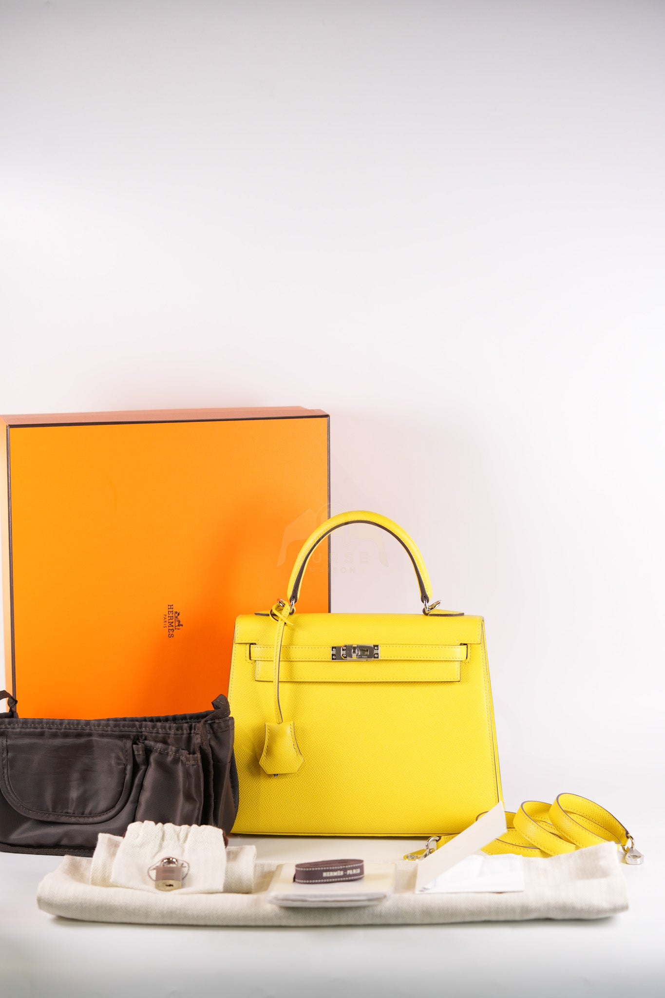 Kelly 25 in Jaune De Naples Sellier Epsom Leather & Palladium Hardware Stamp U (2022) | Purse Maison Luxury Bags Shop
