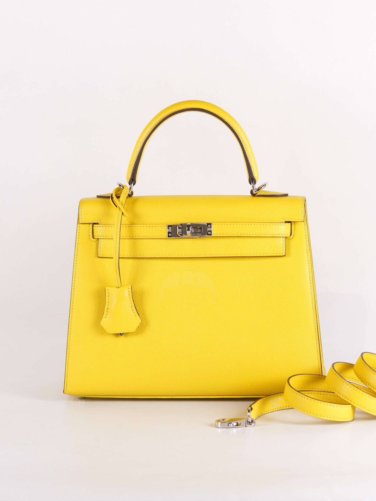 Kelly 25 in Jaune De Naples Sellier Epsom Leather & Palladium Hardware Stamp U (2022) | Purse Maison Luxury Bags Shop