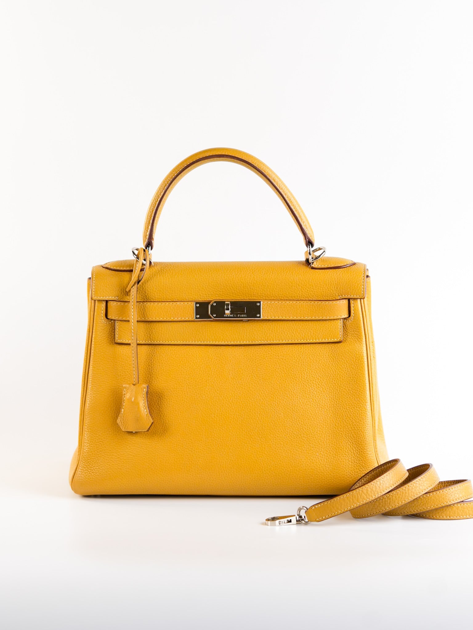 Kelly 28 Curry in Clemence Leather and Palladium Hardware Stamp Square L | Purse Maison Luxury Bags Shop