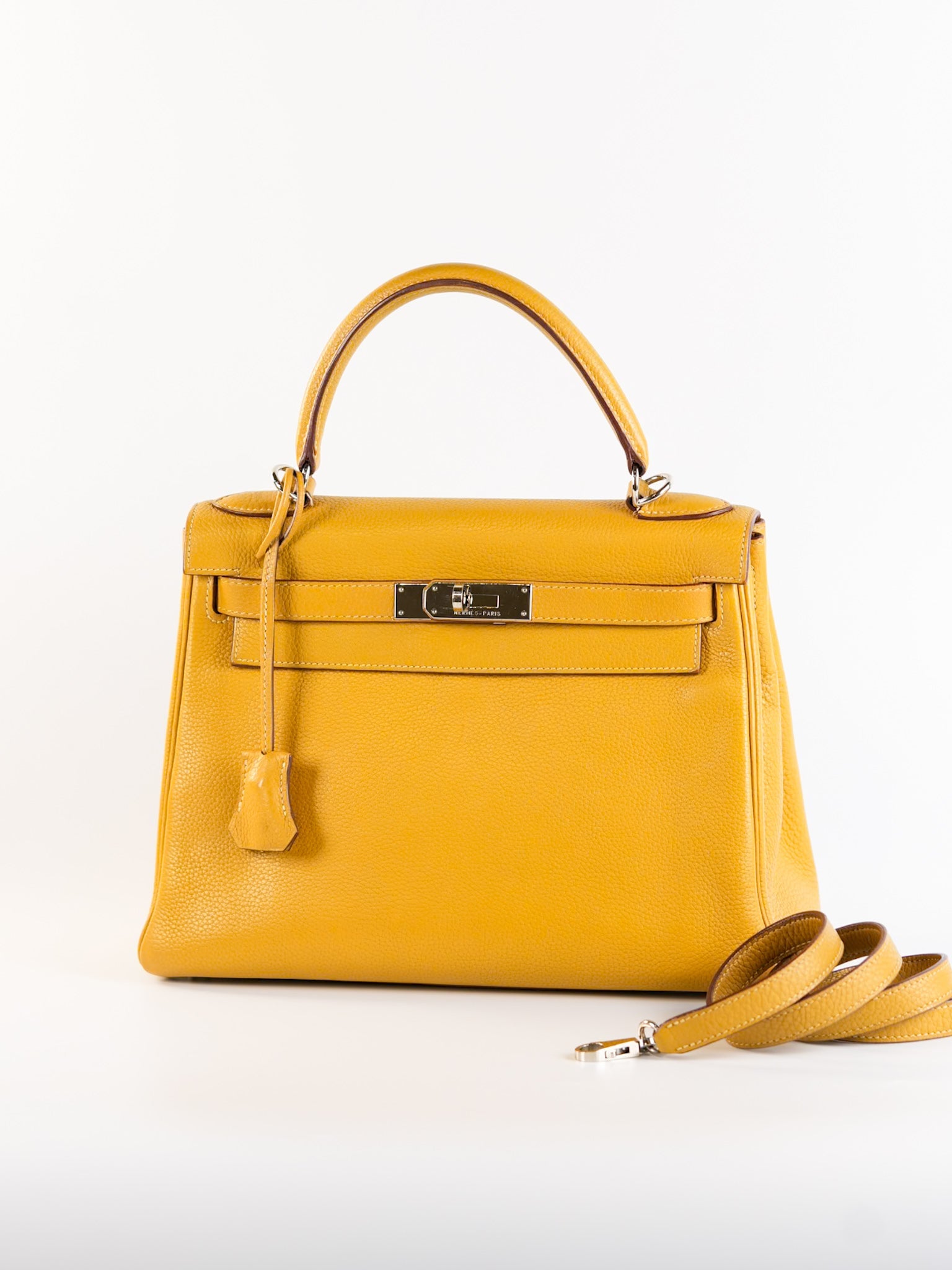 Kelly 28 Curry in Clemence Leather and Palladium Hardware Stamp Square L | Purse Maison Luxury Bags Shop