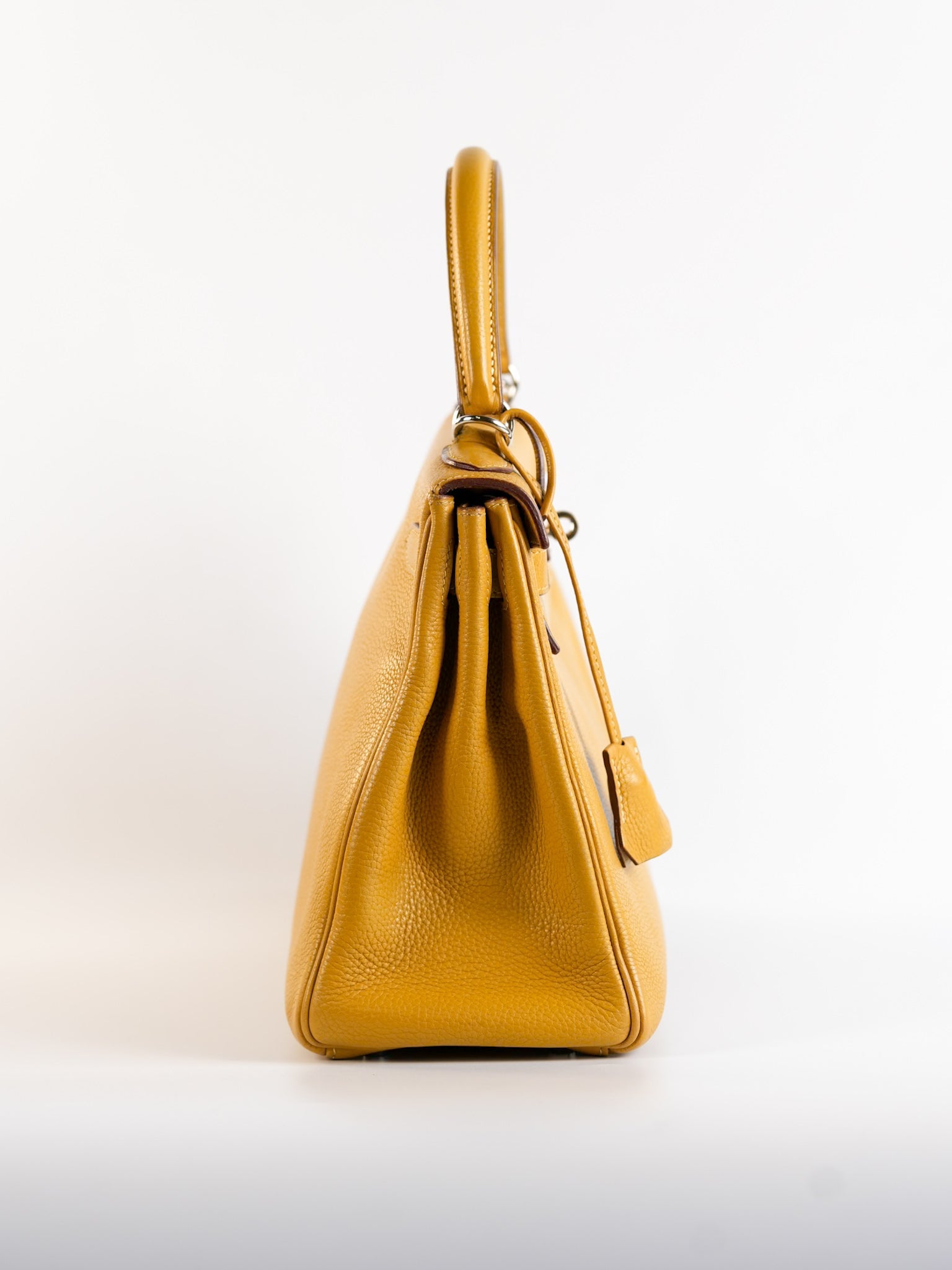 Kelly 28 Curry in Clemence Leather and Palladium Hardware Stamp Square L | Purse Maison Luxury Bags Shop