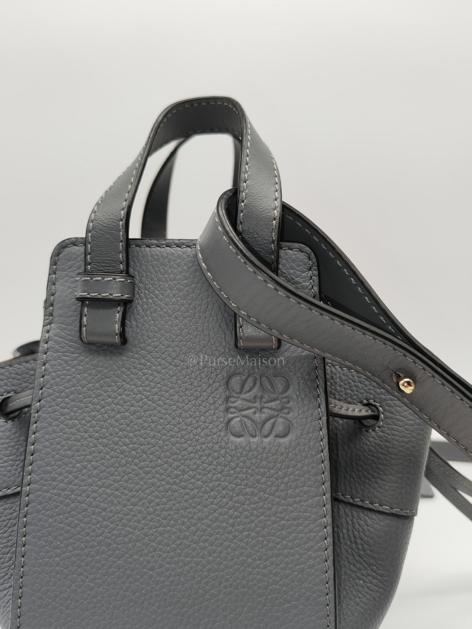 Loewe Mini Hammock Drawstring Bag in Gray Grained Calfskin Leather and Gold Hardware | Purse Maison Luxury Bags Shop