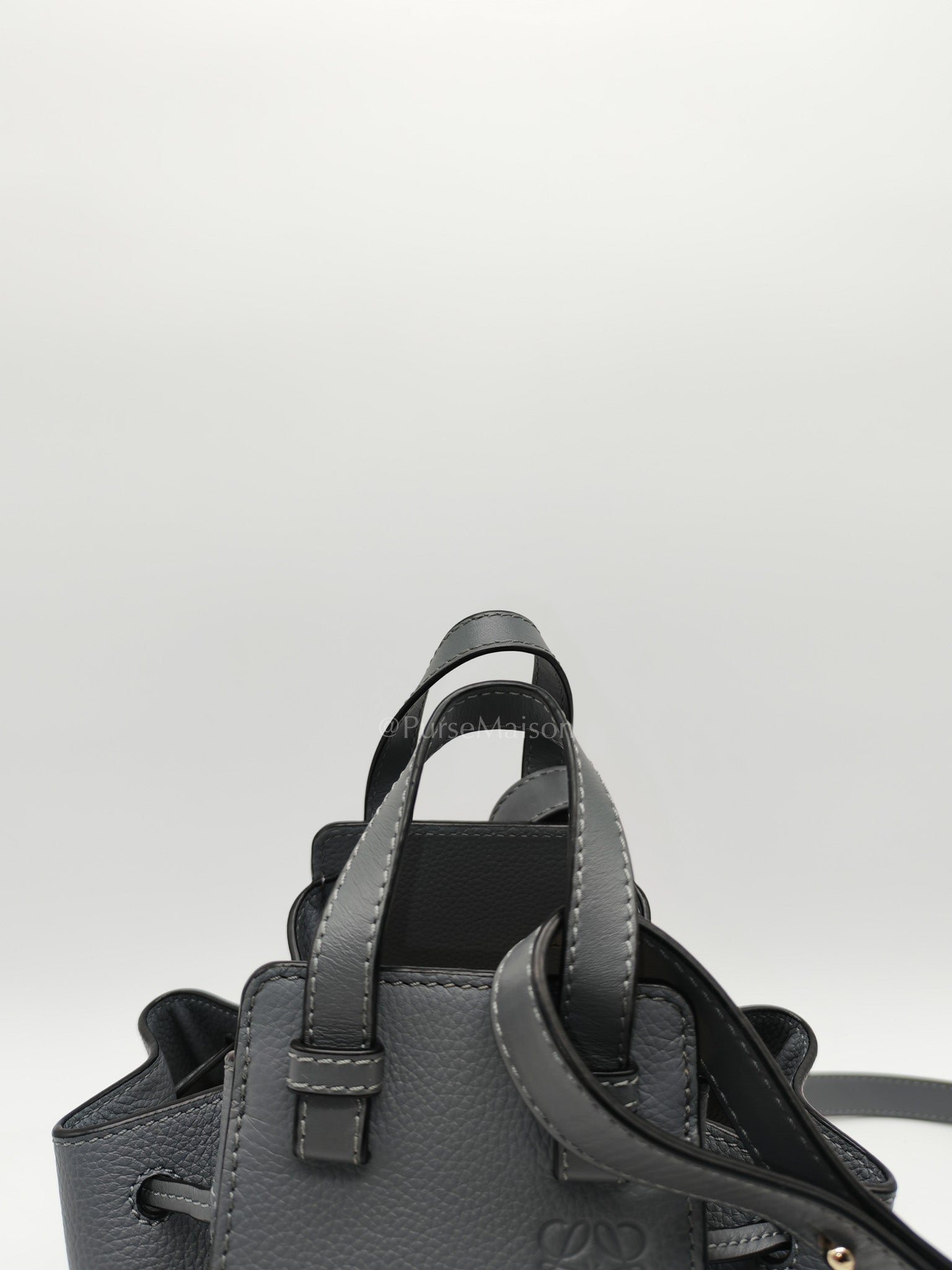 Loewe Mini Hammock Drawstring Bag in Gray Grained Calfskin Leather and Gold Hardware | Purse Maison Luxury Bags Shop