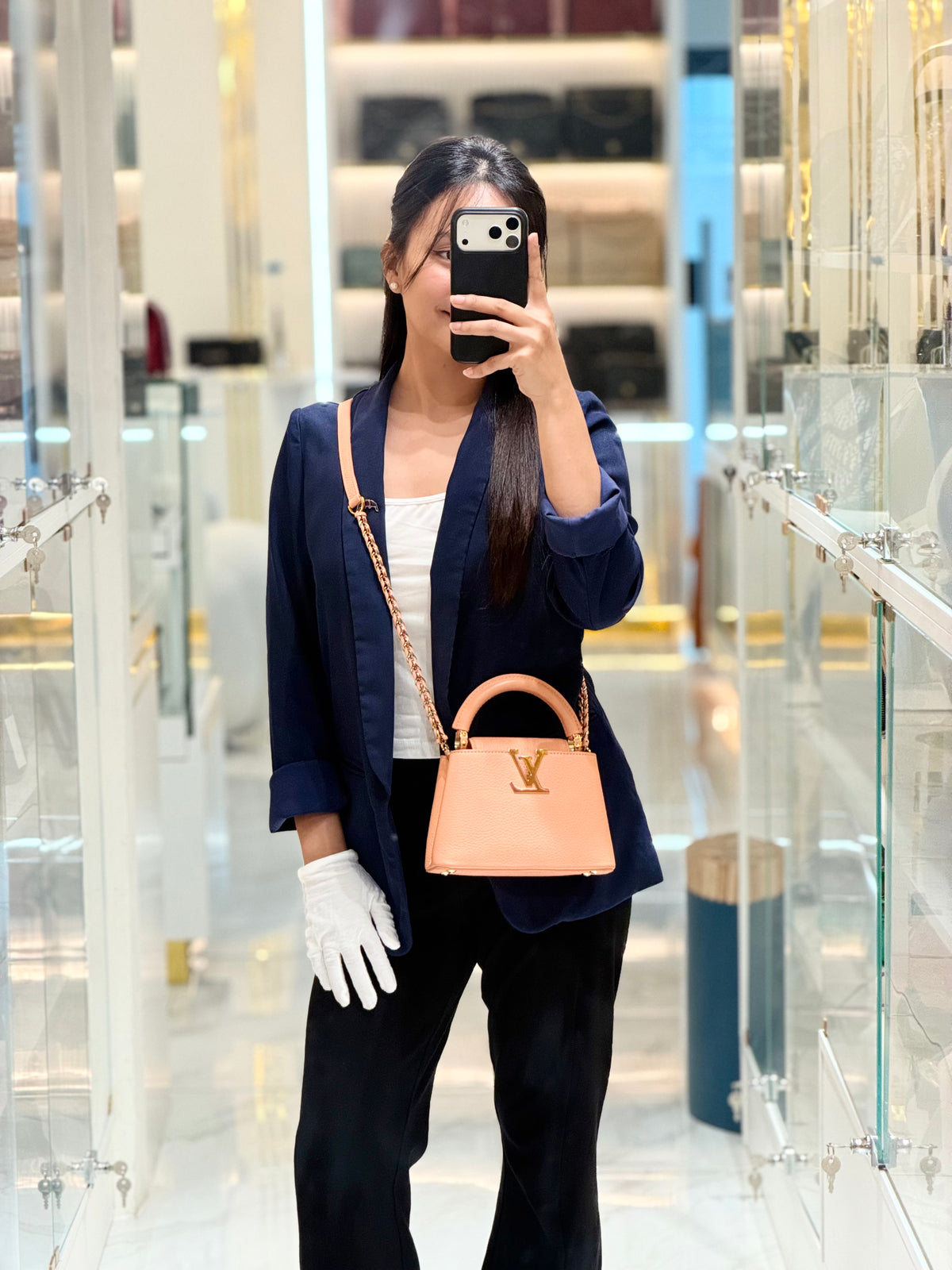 Louis Vuitton Capucines Mini Handbag in Peach Taurillon Leather and Iridescent Rainbow Hardware Microchip | Purse Maison Luxury Bags Shop