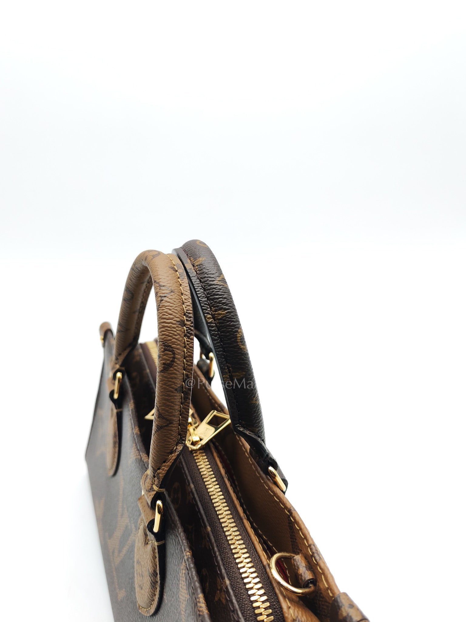 Louis Vuitton On The Go East West in Monogram Reverse Canvas (Microchip) | Purse Maison Luxury Bags Shop