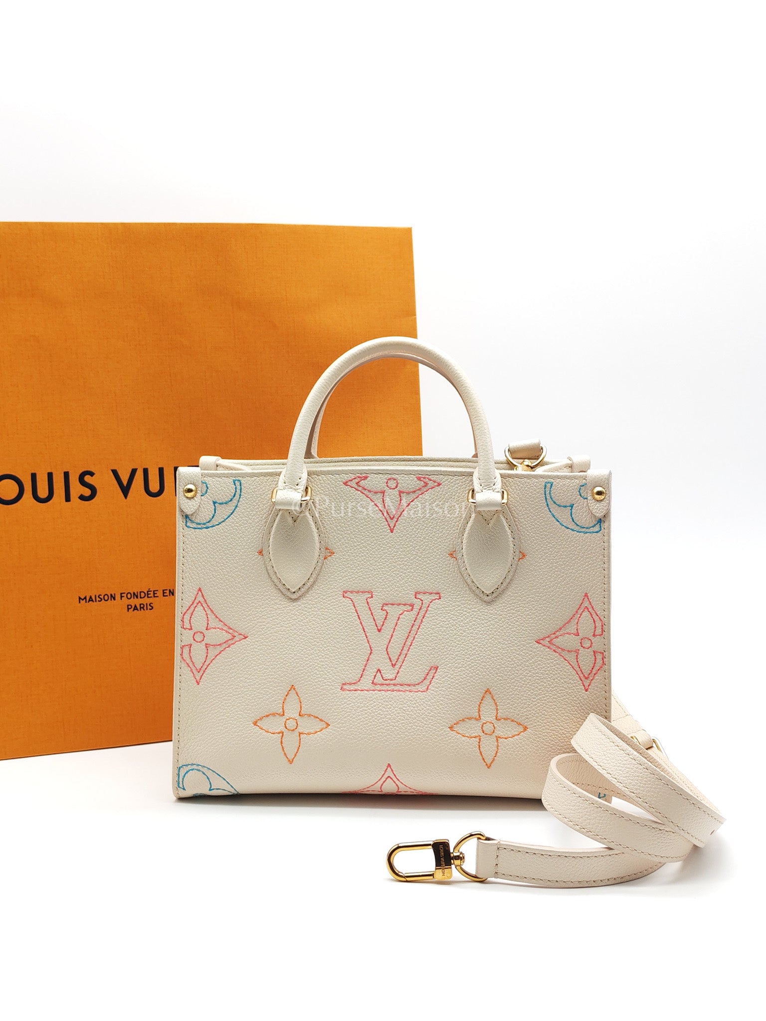 Louis Vuitton On The Go PM in White Monogram Empreinte Leather (Microchip) | Purse Maison Luxury Bags Shop