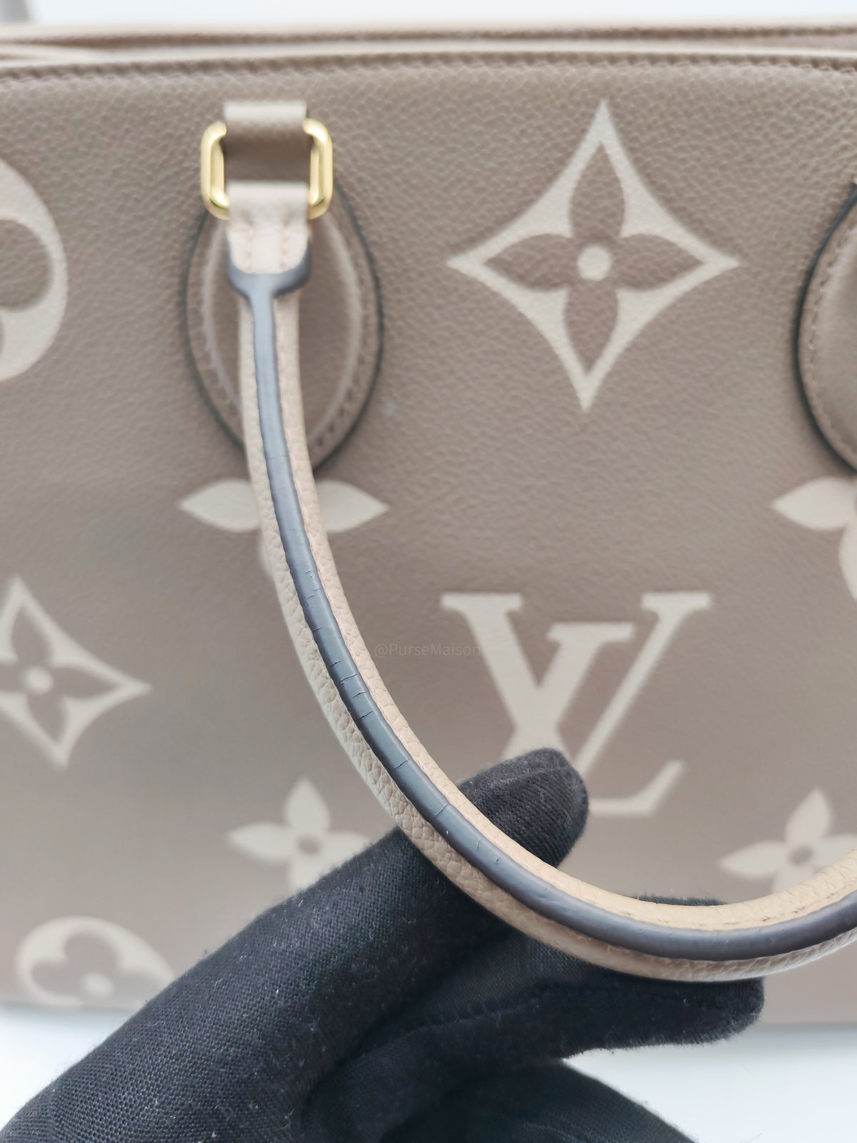 Louis Vuitton OntheGo (OTG) MM in Tourterelle/Creme Monogram Empriente Leather and Gold Hardware Microchip | Purse Maison Luxury Bags Shop