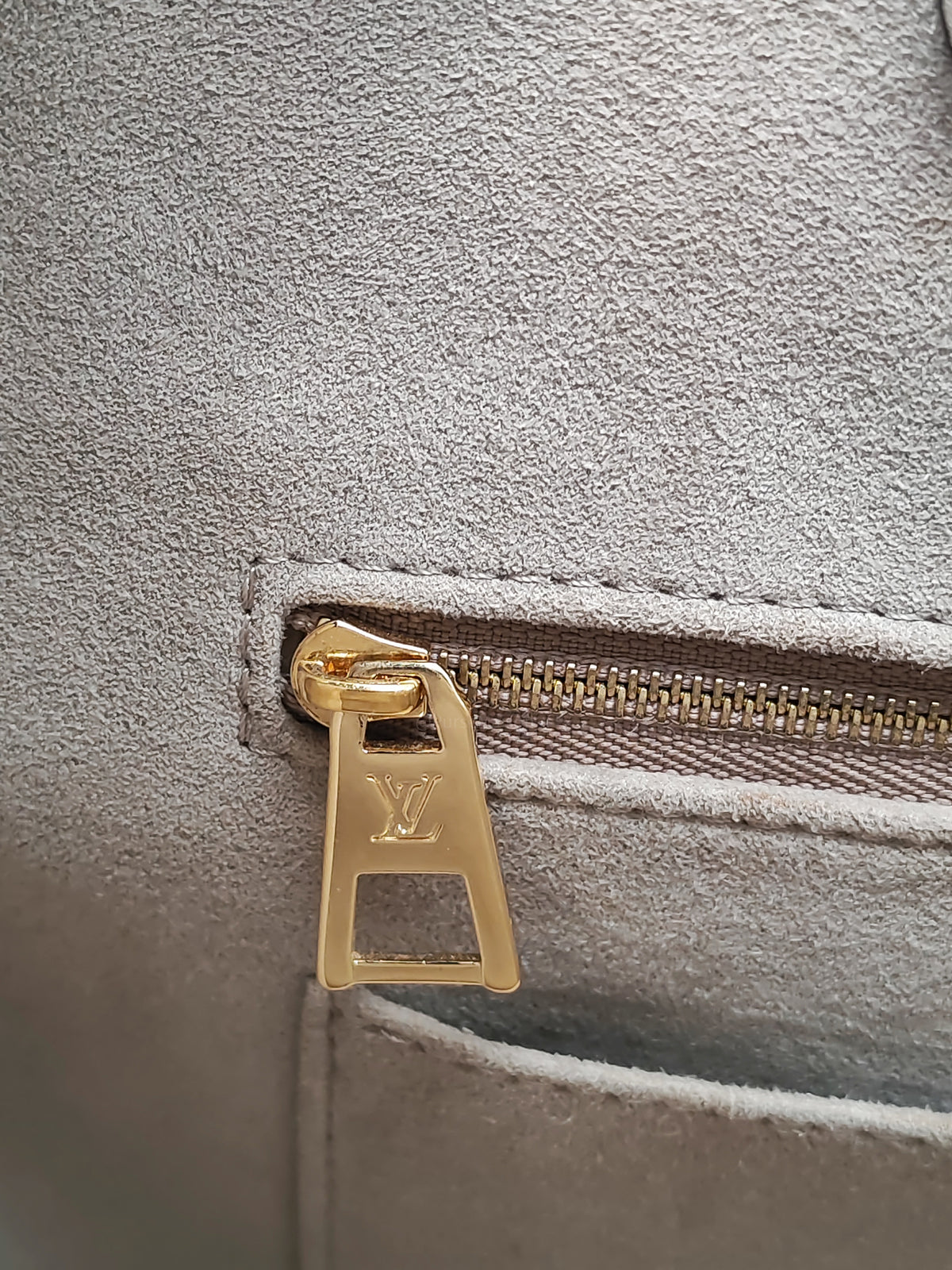 Louis Vuitton OntheGo (OTG) MM in Tourterelle/Creme Monogram Empriente Leather and Gold Hardware Microchip | Purse Maison Luxury Bags Shop
