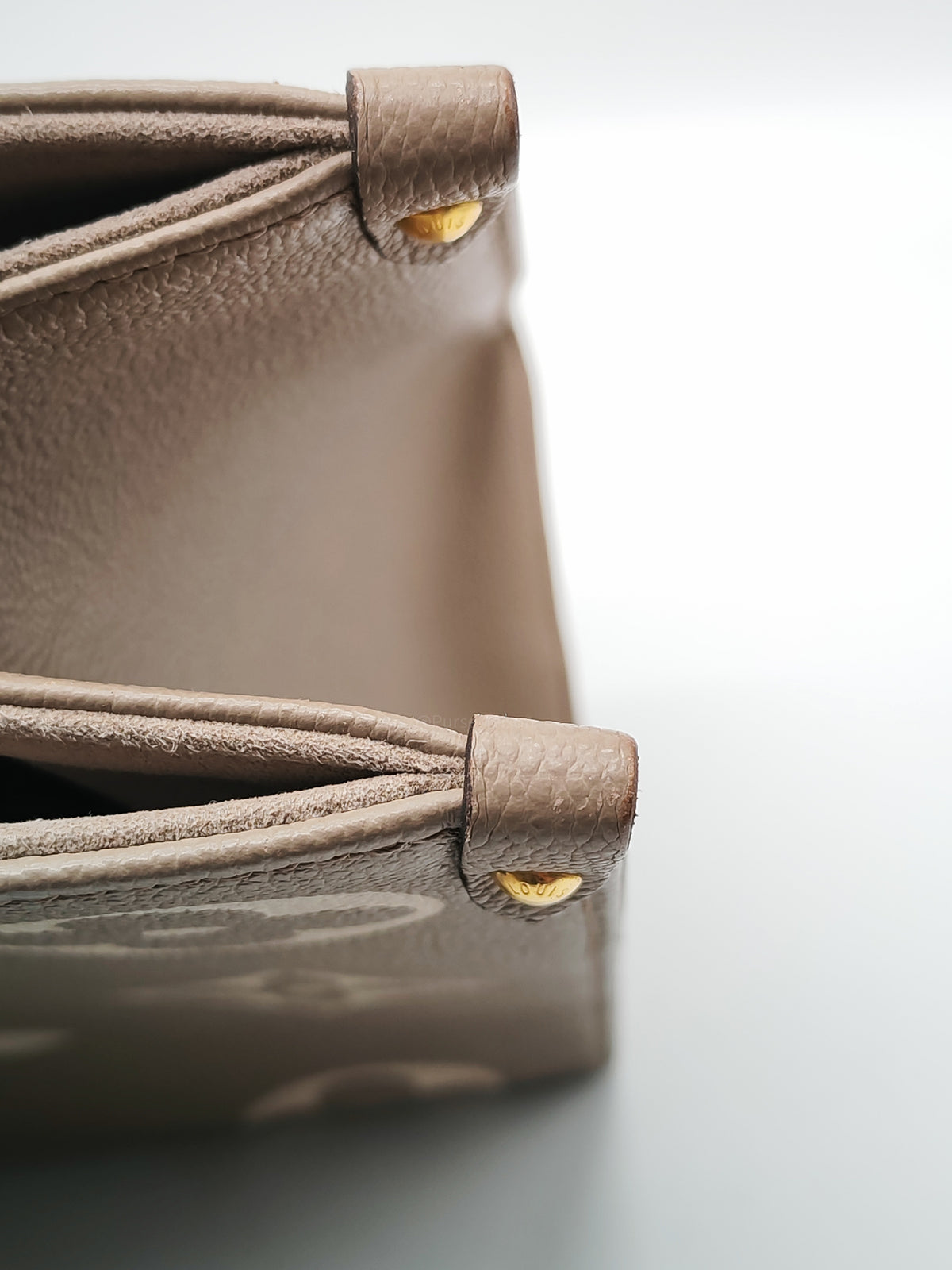 Louis Vuitton OntheGo (OTG) MM in Tourterelle/Creme Monogram Empriente Leather and Gold Hardware Microchip | Purse Maison Luxury Bags Shop