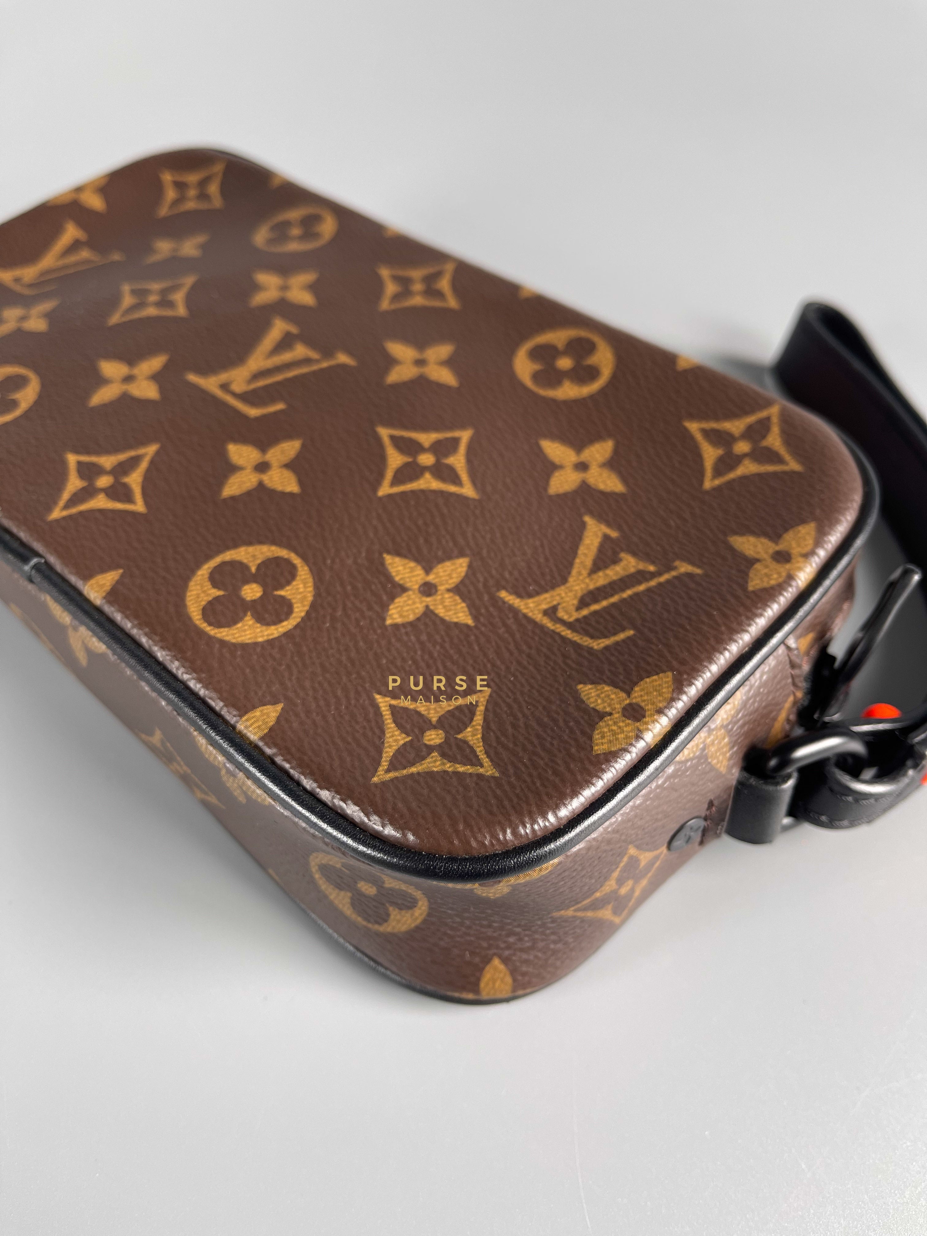 Louis Vuitton Pochette Volga Clutch Bag in Monogram Canvas