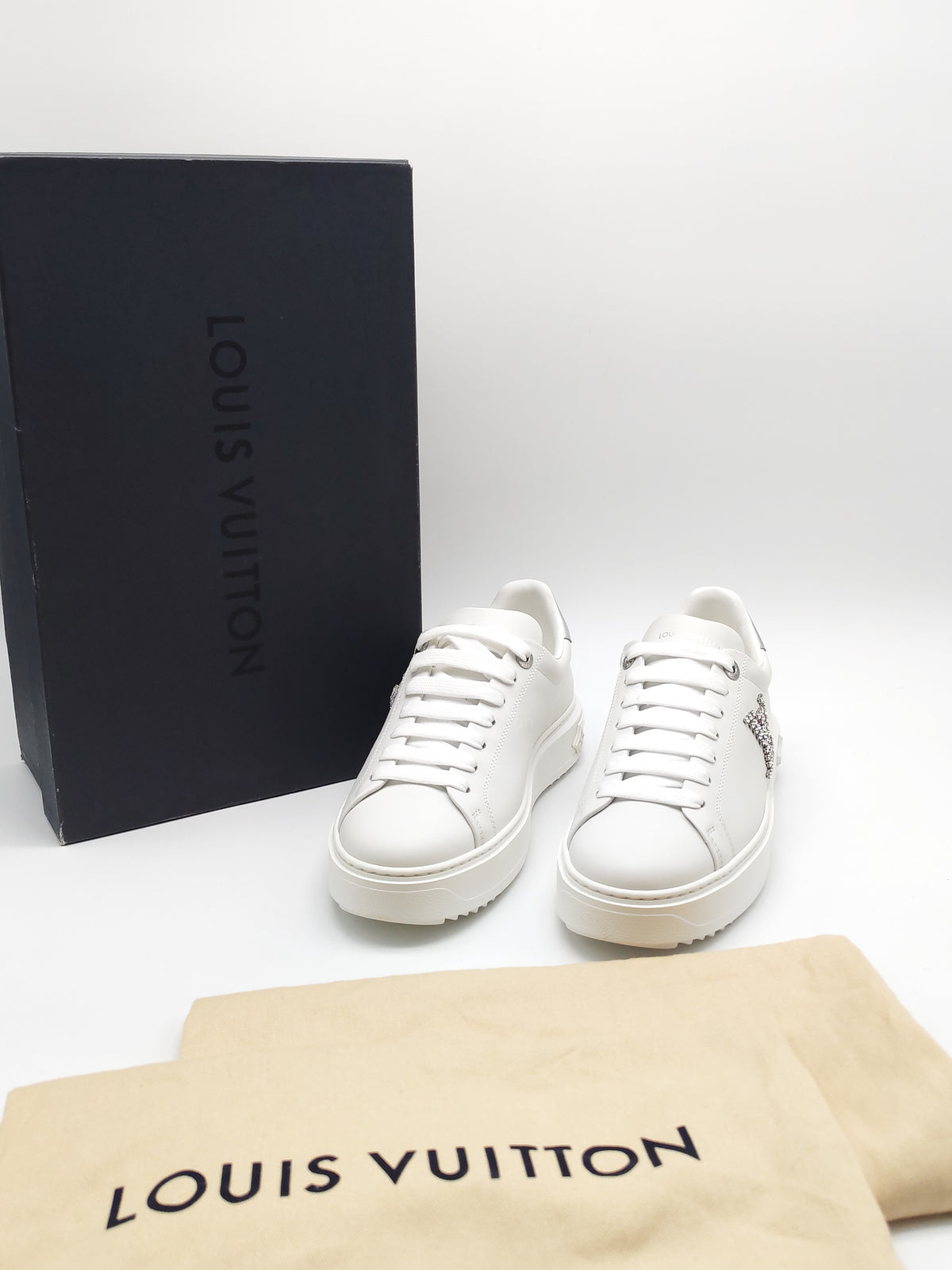 Louis Vuitton Time Out Sneaker in White with Silver Rhinestone Logo Size 38 EU (25.5 cm) | Purse Maison Luxury Bags Shop