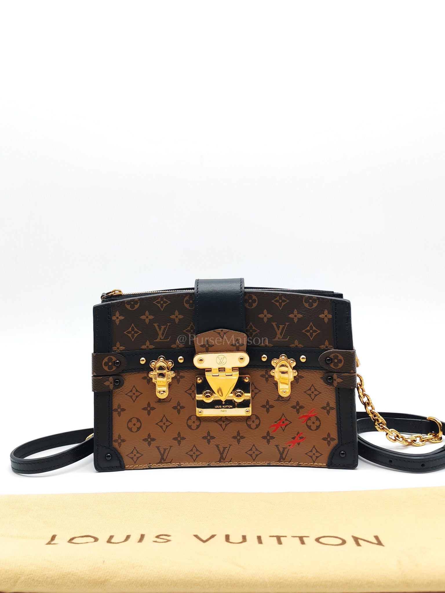 Trunk Clutch in Reverse Monogram & Gold Hardware Microchip