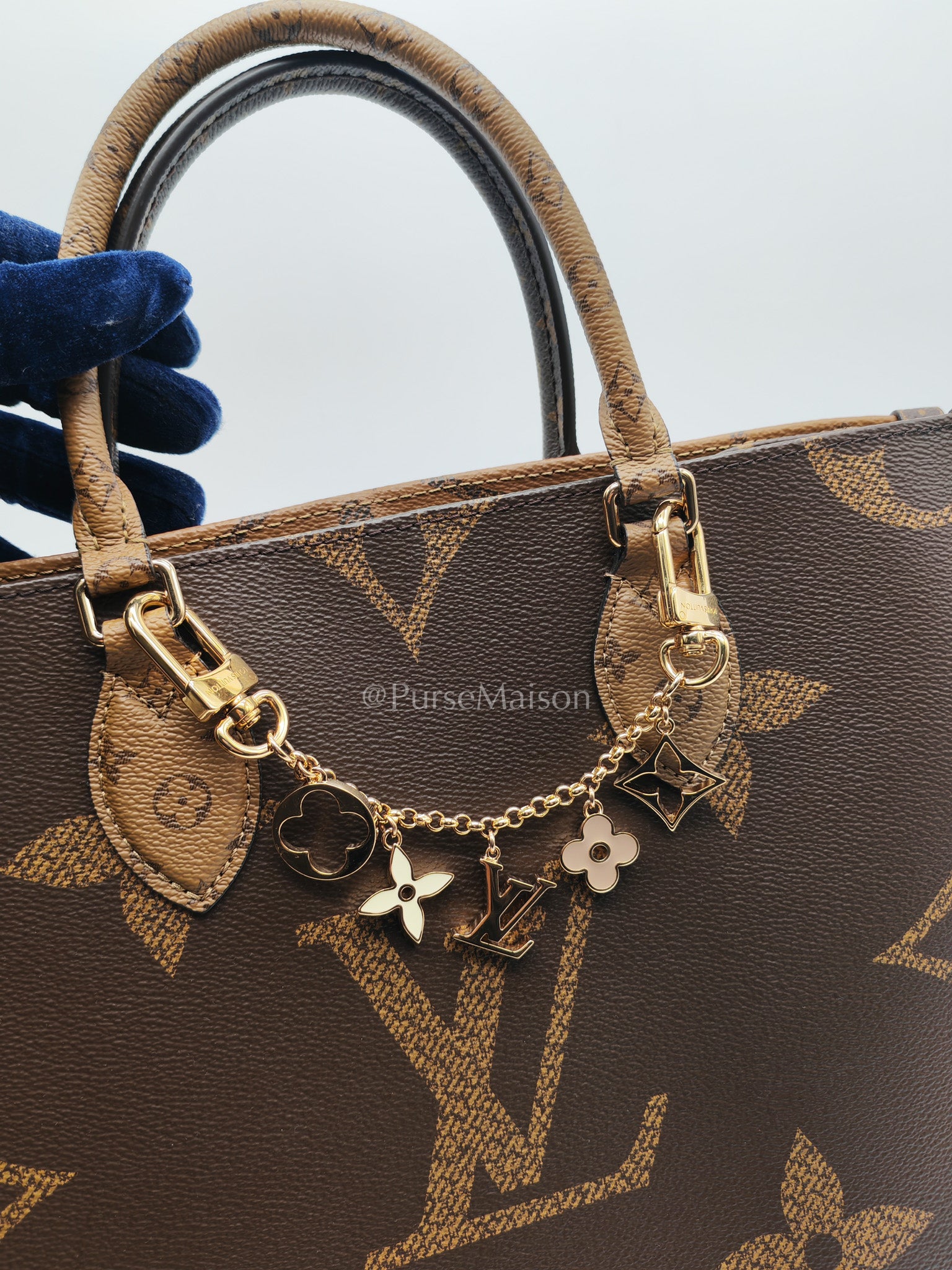 Louis Vuitton OntheGo MM in Reverse Monogram Canvas and Gold Hardware Microchip