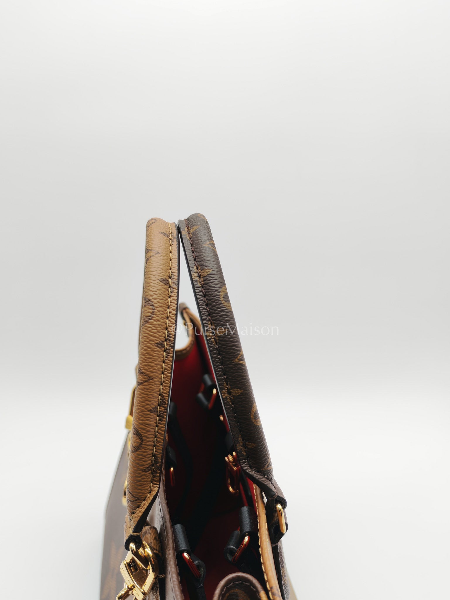 Louis Vuitton OntheGo MM in Reverse Monogram Canvas and Gold Hardware Microchip