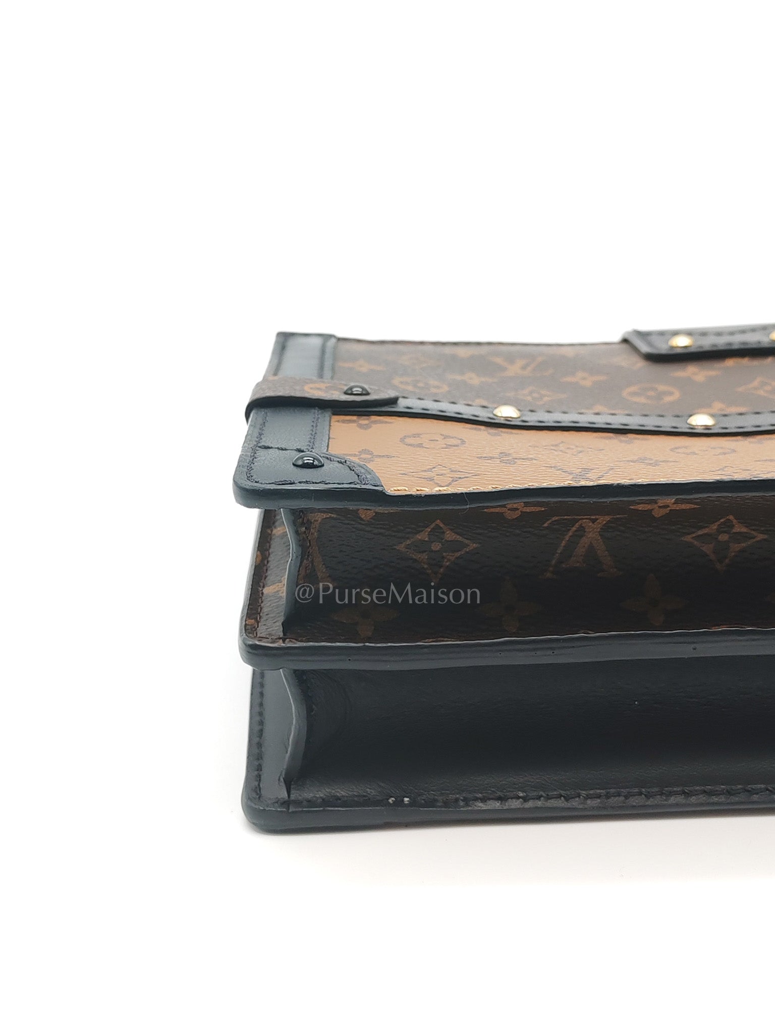 Trunk Clutch Bag in Monogram Reverse Canvas & Gold Hardware Microchip