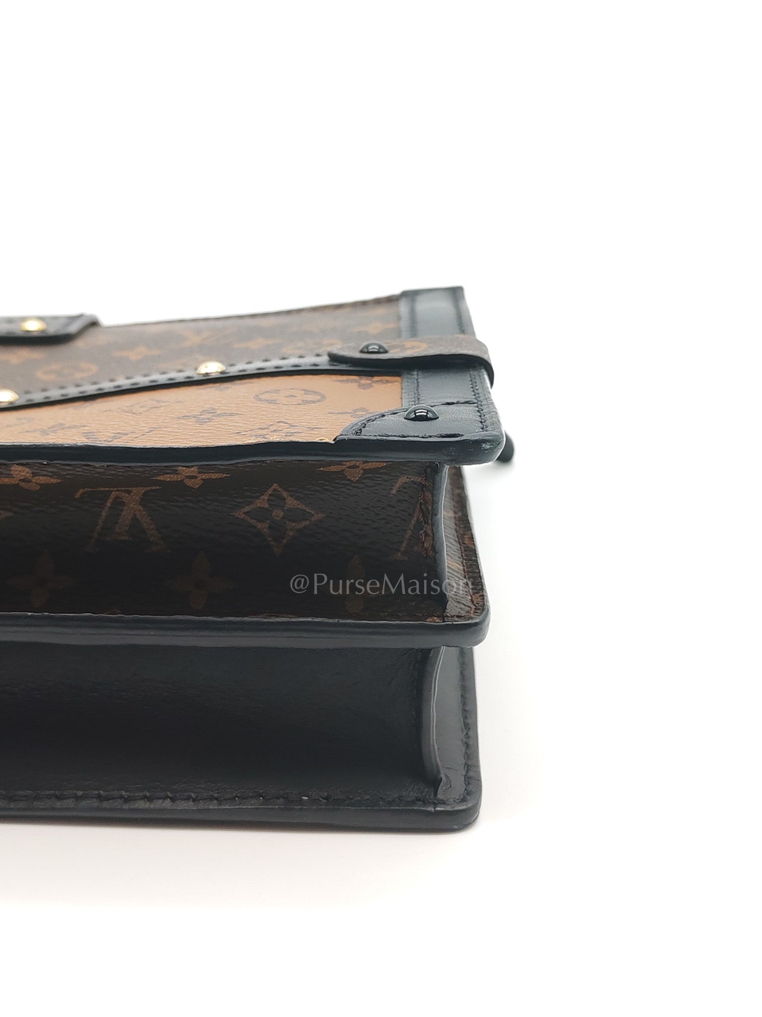 Trunk Clutch Bag in Monogram Reverse Canvas & Gold Hardware Microchip