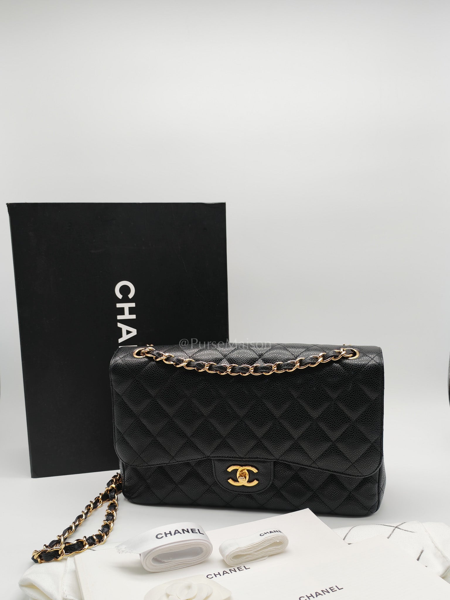 Classic Double Flap Jumbo In Black Caviar Leather and Gold Hardware Series 15