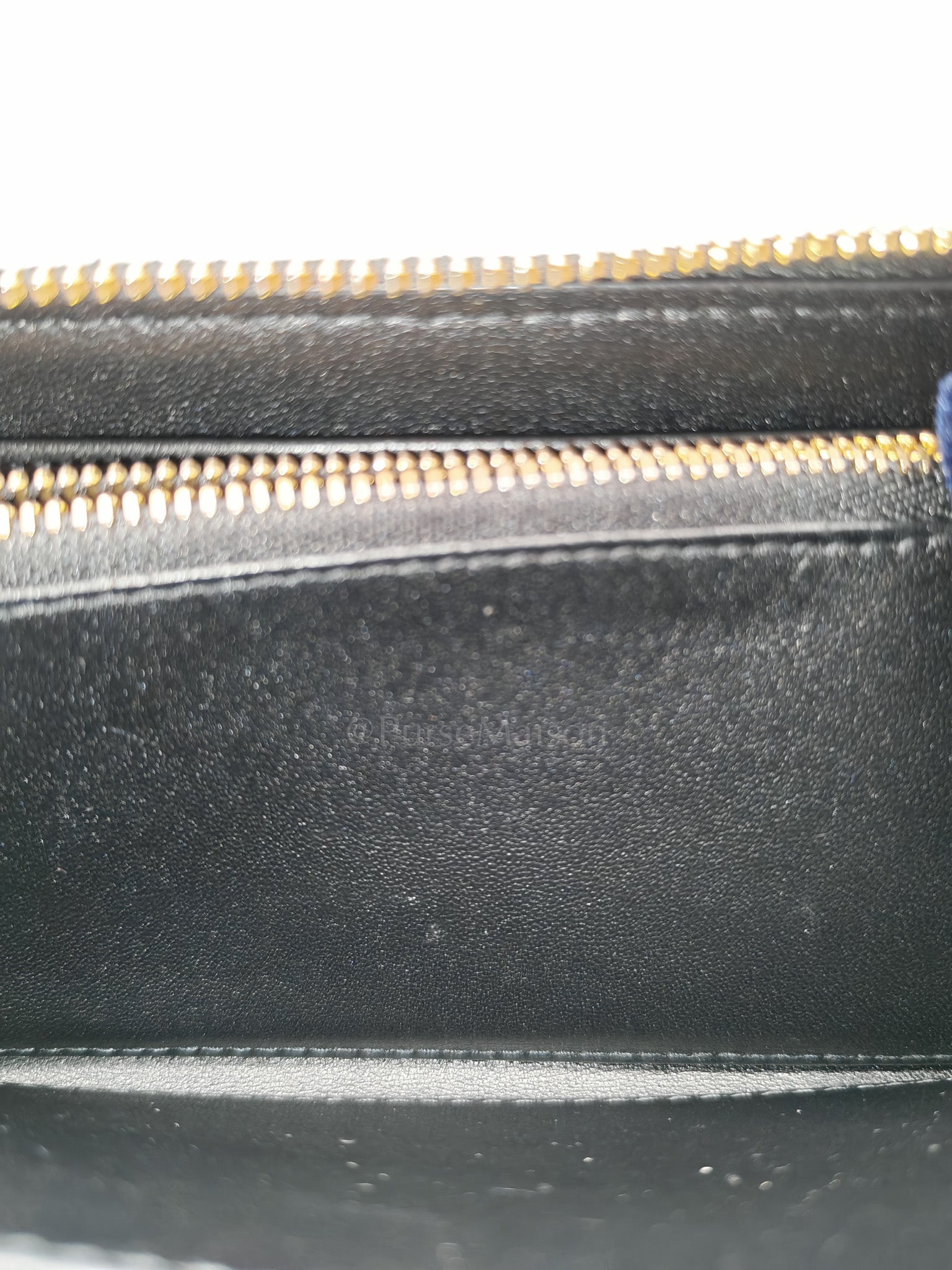 Voyaguer in Black Cannage Lambskin Leather Long Zip Wallet