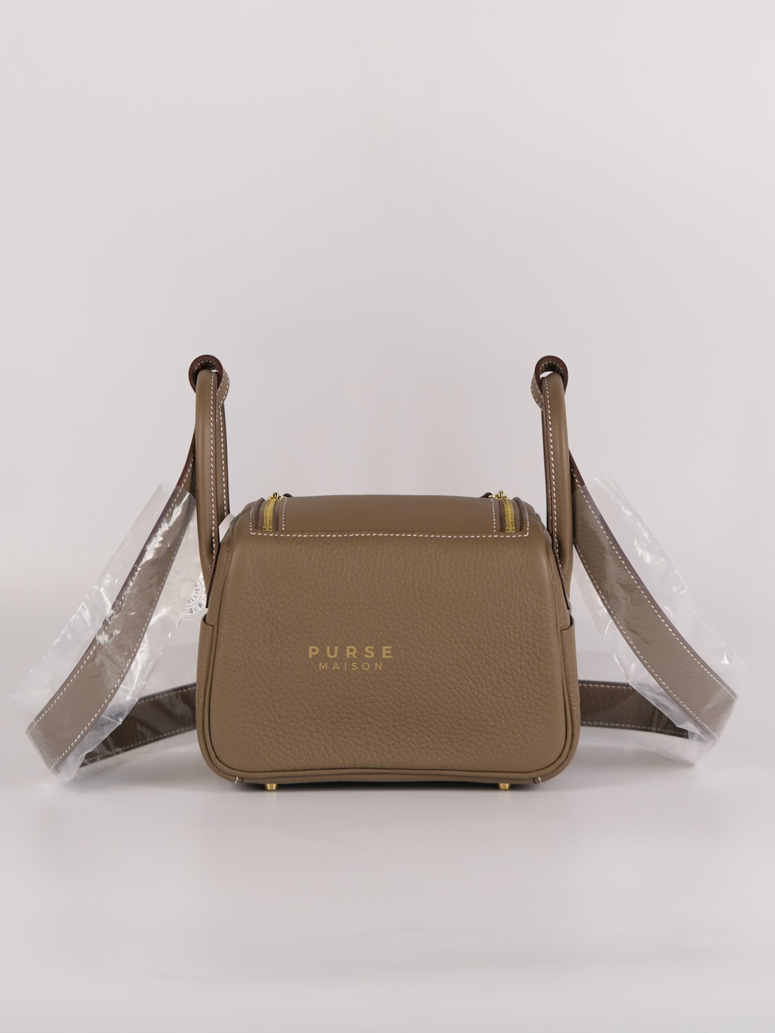 Mini Lindy Etoupe in Taurillion Clemence Leather and Gold Hardware Stamp W (2024) | Purse Maison Luxury Bags Shop