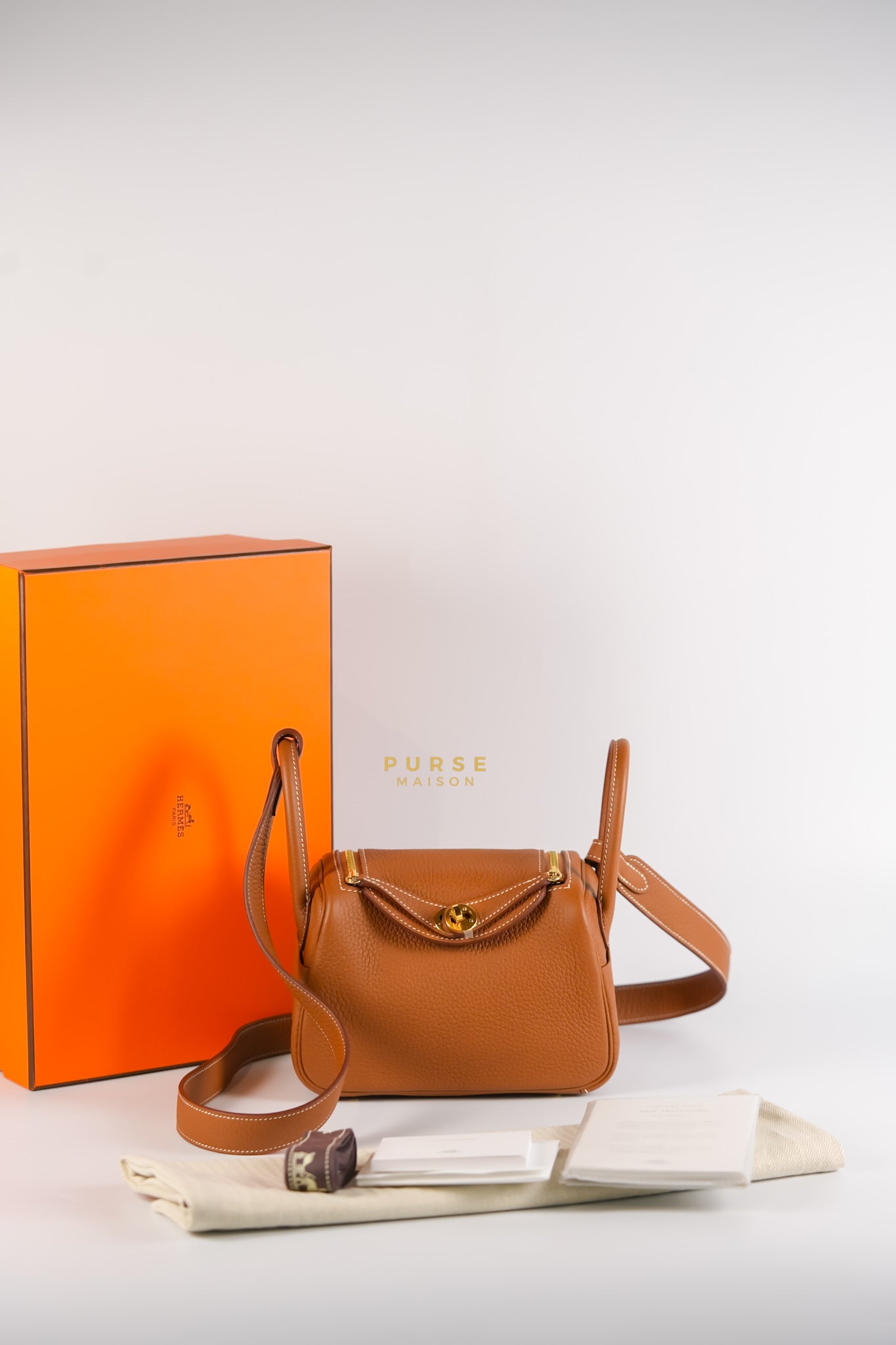 Mini Lindy Gold Clemence Leather in Gold Hardware Stamp U | Purse Maison Luxury Bags Shop