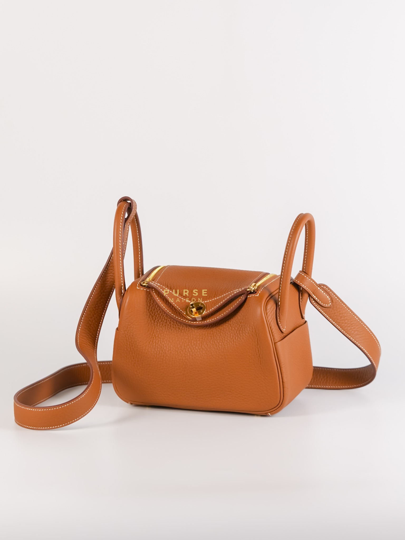Mini Lindy Gold Clemence Leather in Gold Hardware Stamp U | Purse Maison Luxury Bags Shop