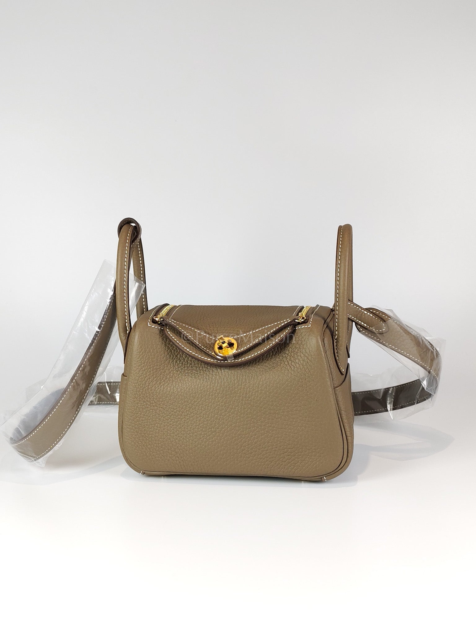 Mini Lindy in Etoupe Clemence Leather and Gold Hardware Stamp K(2025) | Purse Maison Luxury Bags Shop