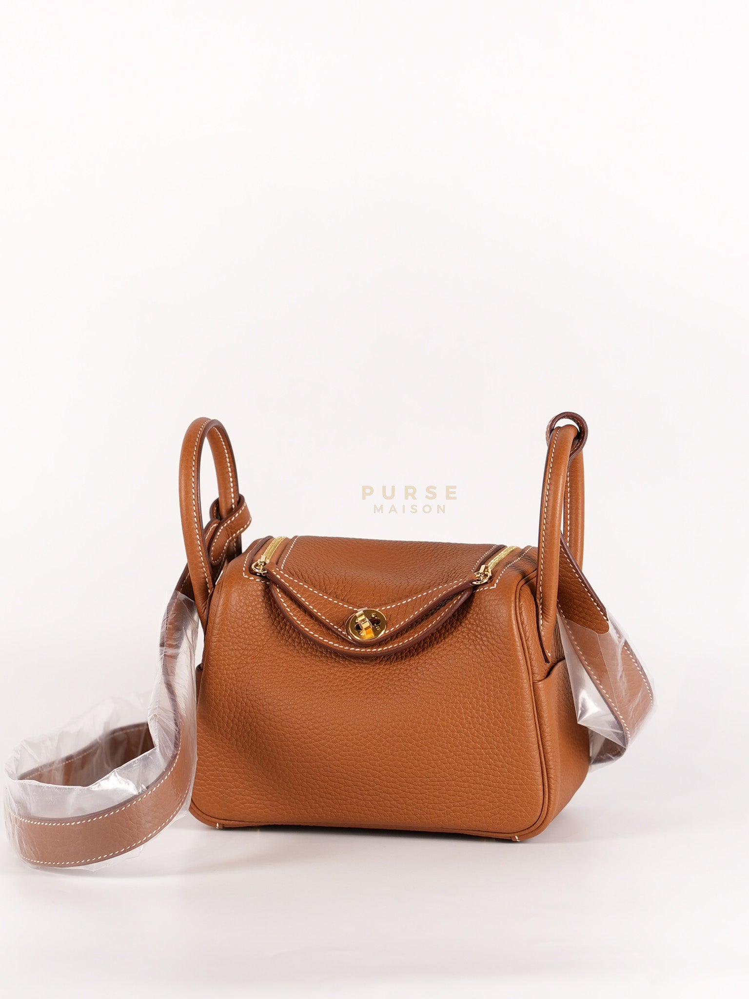 Mini Lindy in Gold Clemence Leather and Gold Hardware Stamp W (2024) | Purse Maison Luxury Bags Shop