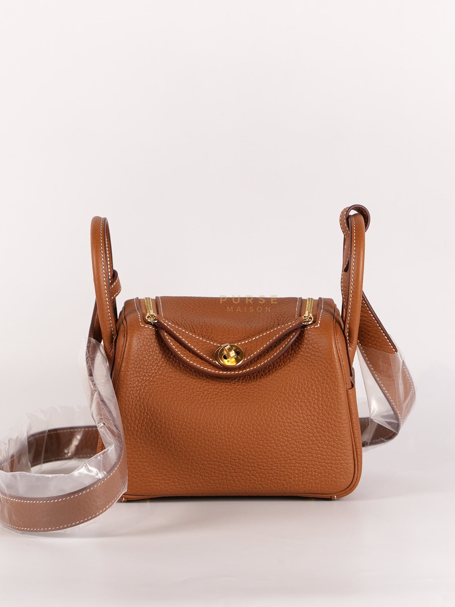 Mini Lindy in Gold Clemence Leather and Gold Hardware Stamp W (2024) | Purse Maison Luxury Bags Shop
