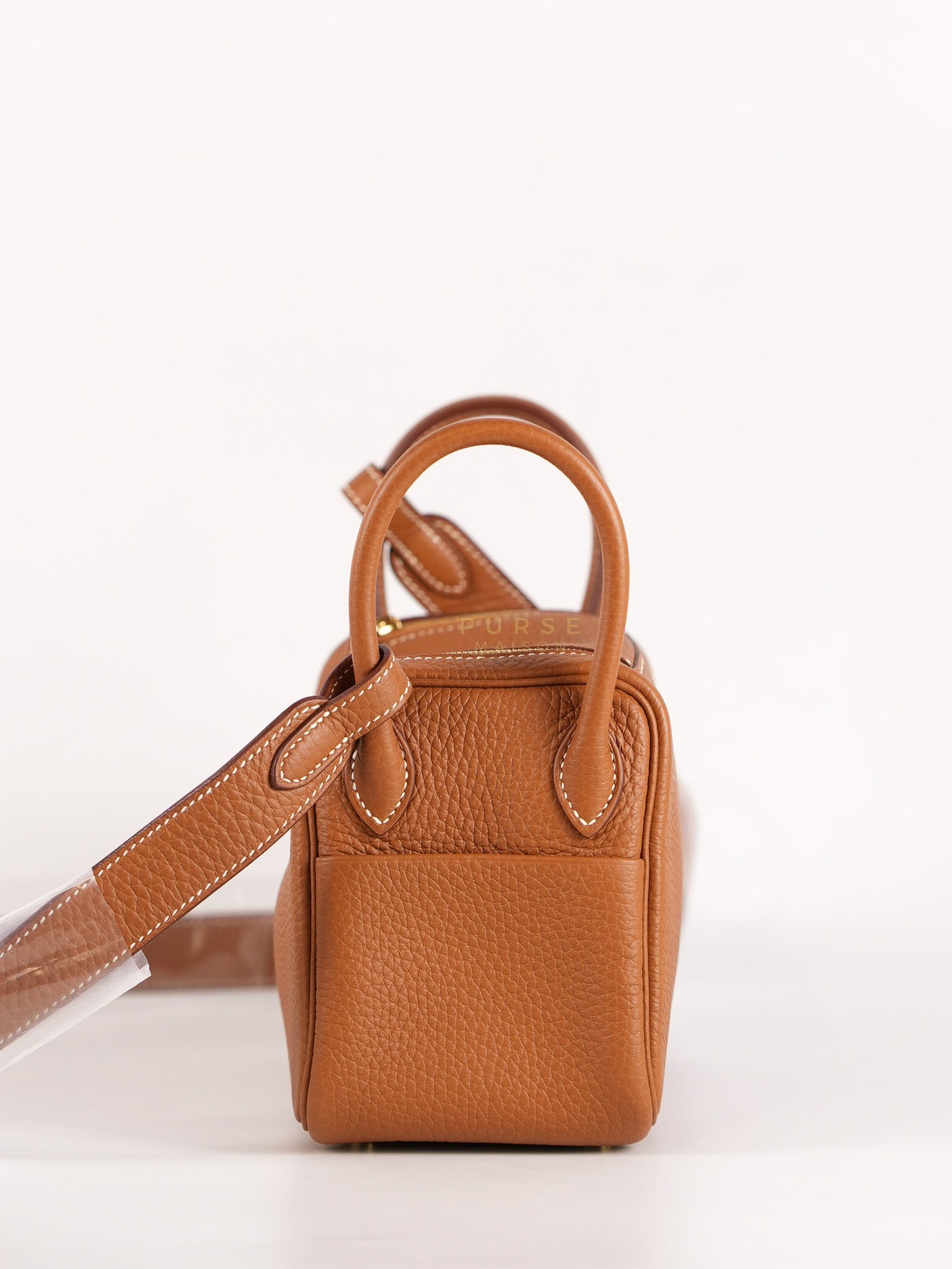 Mini Lindy in Gold Clemence Leather and Gold Hardware Stamp W (2024) | Purse Maison Luxury Bags Shop
