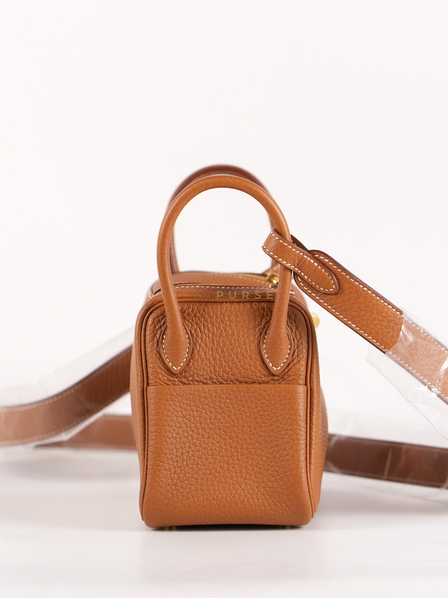 Mini Lindy in Gold Clemence Leather and Gold Hardware Stamp W (2024) | Purse Maison Luxury Bags Shop