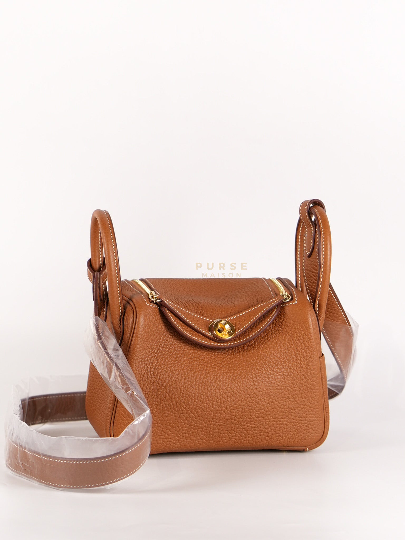Mini Lindy in Gold Clemence Leather and Gold Hardware Stamp W (2024) | Purse Maison Luxury Bags Shop