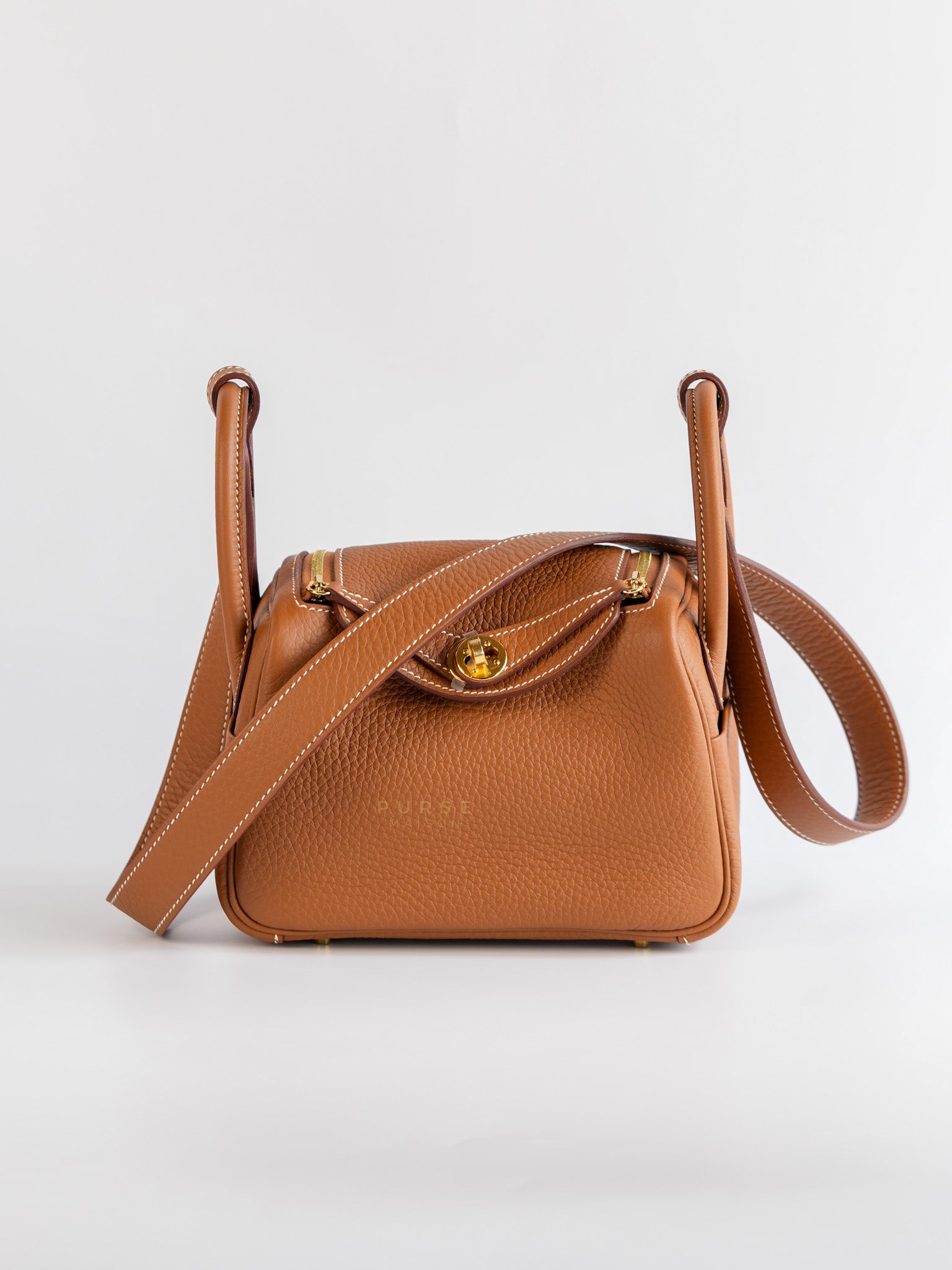 Mini Lindy in Gold Taurillon Clémence Leather with Gold Hardware, Stamp W (2024) | Purse Maison Luxury Bags Shop