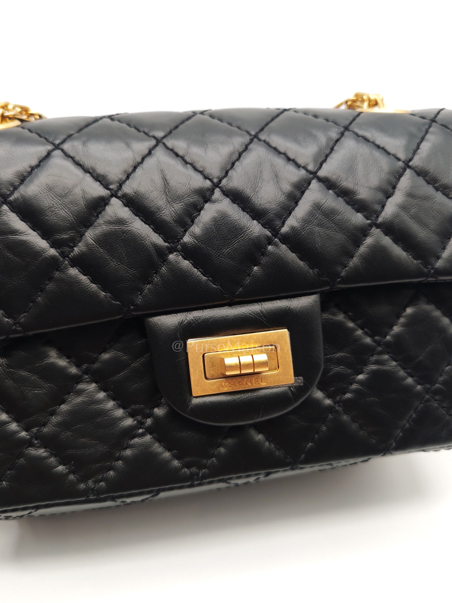 Mini Reissue 2.55 in Black Quilted Distressed Lambskin Leather and Aged Gold Hardware (Microchip) | Purse Maison Luxury Bags Shop