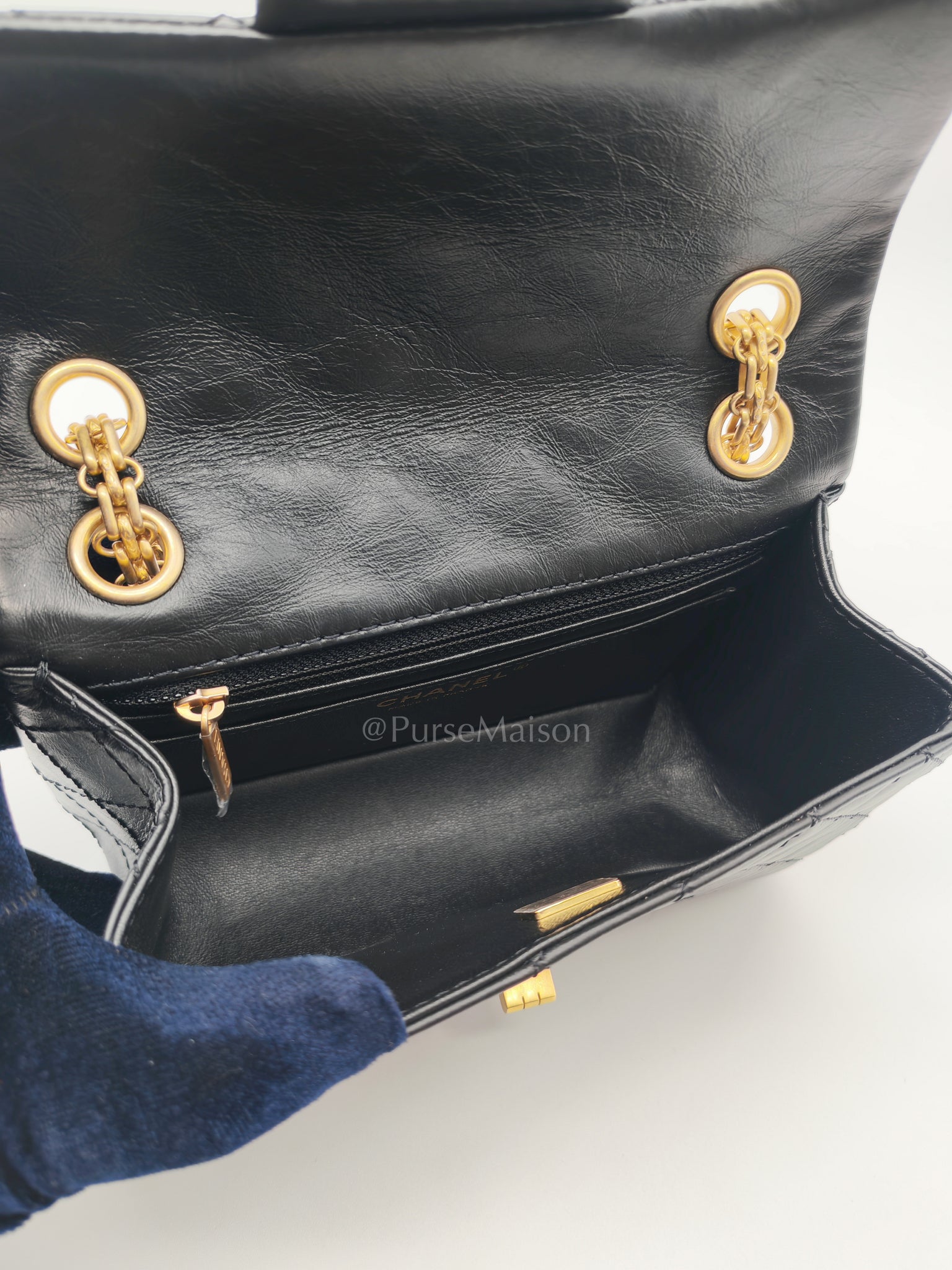 Mini Reissue 2.55 in Black Quilted Distressed Lambskin Leather and Aged Gold Hardware (Microchip) | Purse Maison Luxury Bags Shop