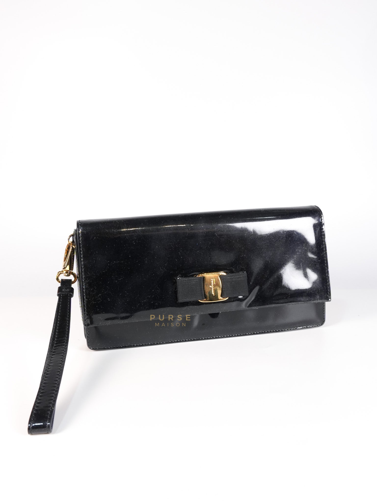 Miss Vara Bow Wristlet Clutch in Plum Patent Leather | Purse Maison Luxury Bags Shop