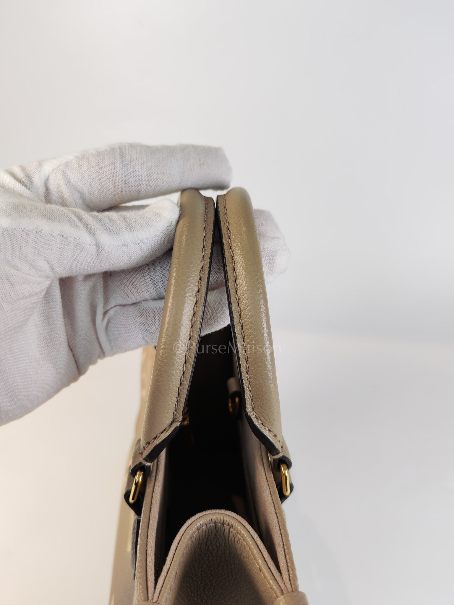 On The Go PM (OTG) in Tourterelle Creme in Monogram Empreinte Leather (Microchip) | Purse Maison Luxury Bags Shop