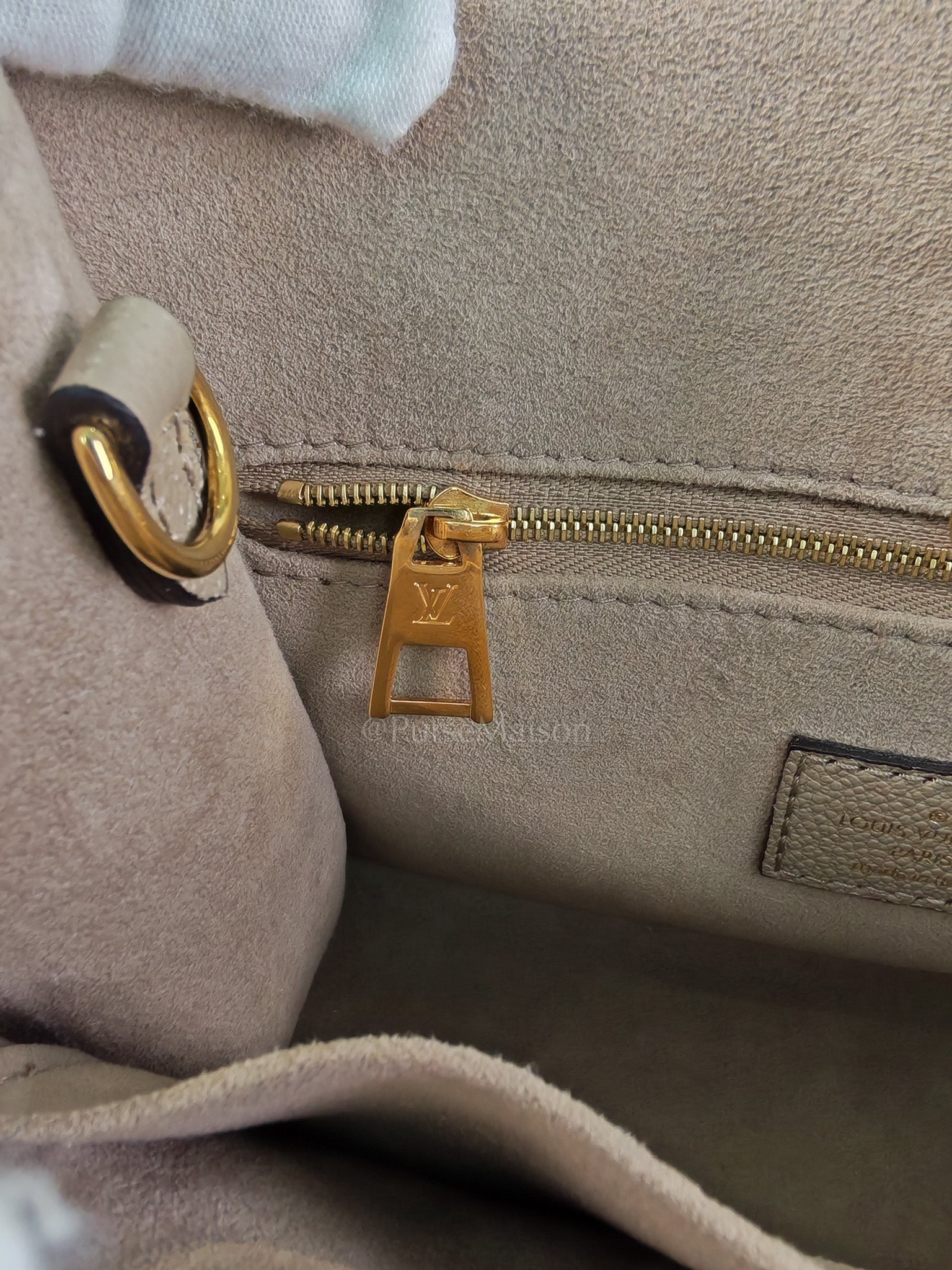 On The Go PM (OTG) in Tourterelle Creme in Monogram Empreinte Leather (Microchip) | Purse Maison Luxury Bags Shop