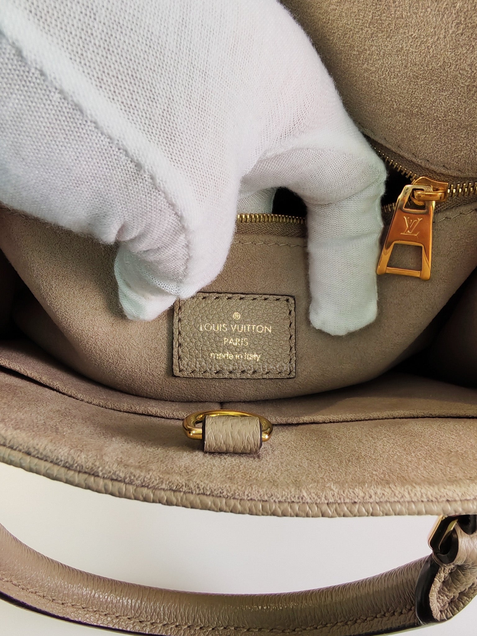 On The Go PM (OTG) in Tourterelle Creme in Monogram Empreinte Leather (Microchip) | Purse Maison Luxury Bags Shop