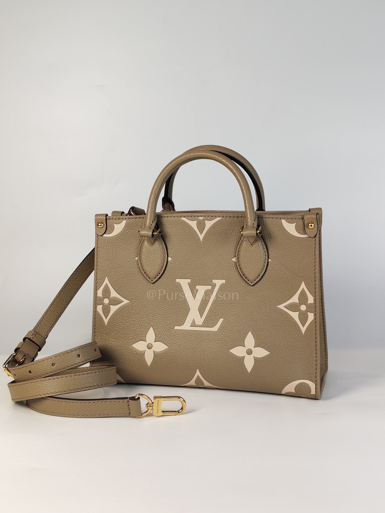 On The Go PM (OTG) in Tourterelle Creme in Monogram Empreinte Leather (Microchip) | Purse Maison Luxury Bags Shop