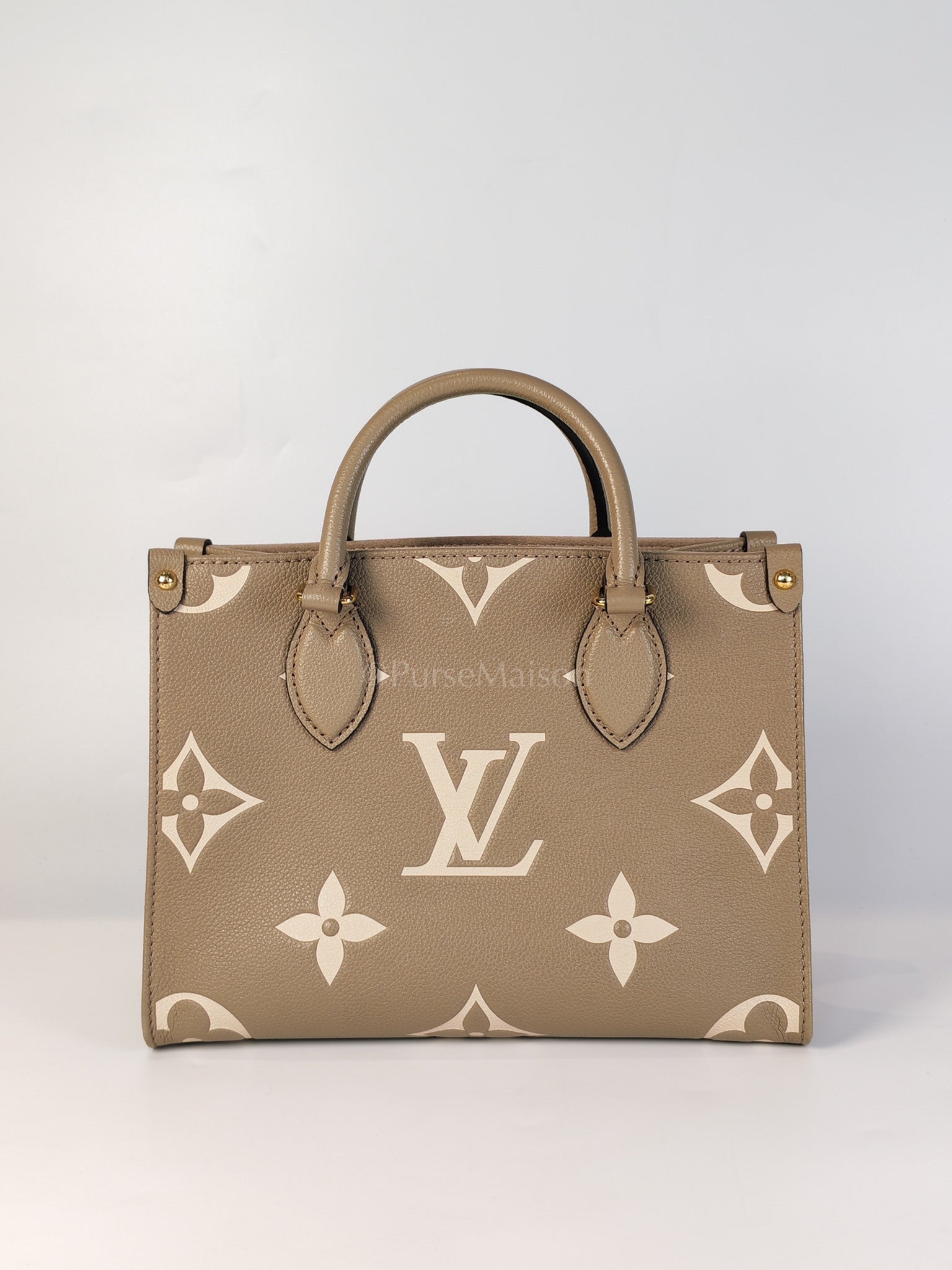 On The Go PM (OTG) in Tourterelle Creme in Monogram Empreinte Leather (Microchip) | Purse Maison Luxury Bags Shop