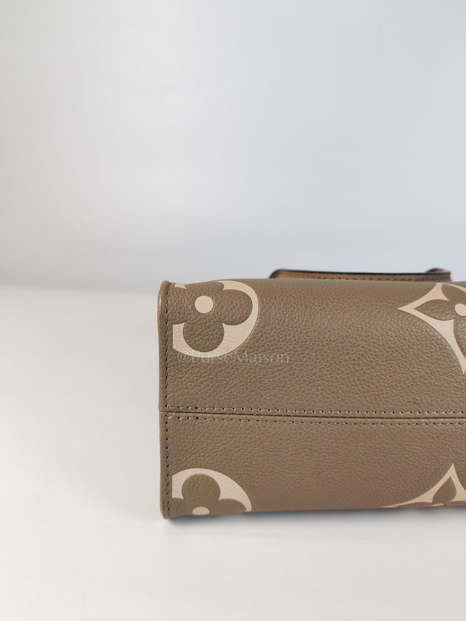 On The Go PM (OTG) in Tourterelle Creme in Monogram Empreinte Leather (Microchip) | Purse Maison Luxury Bags Shop