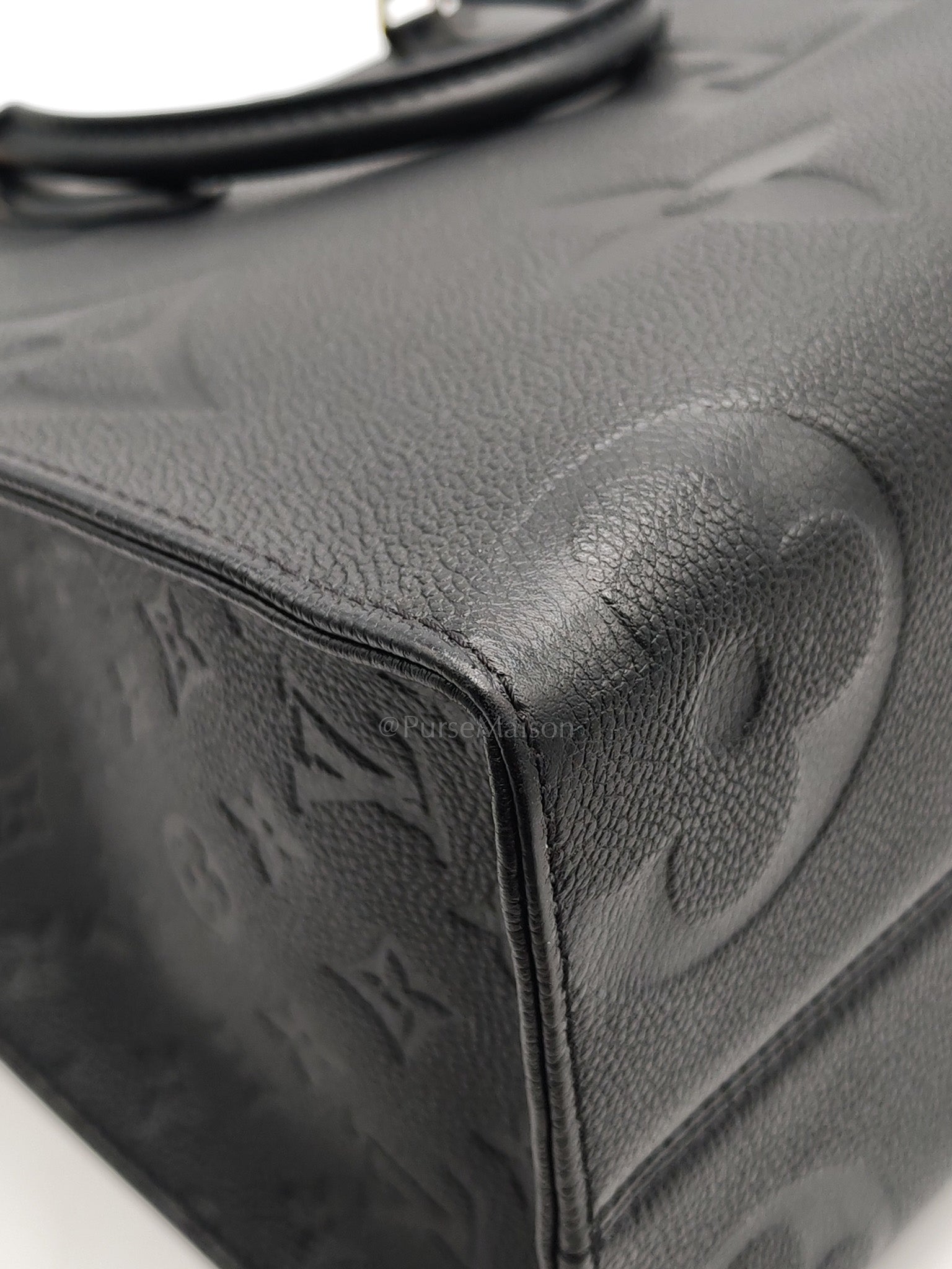 OnTheGo (OTG) MM in Black Monogram Empreinte Leather & Gold Hardware Microchip | Purse Maison Luxury Bags Shop