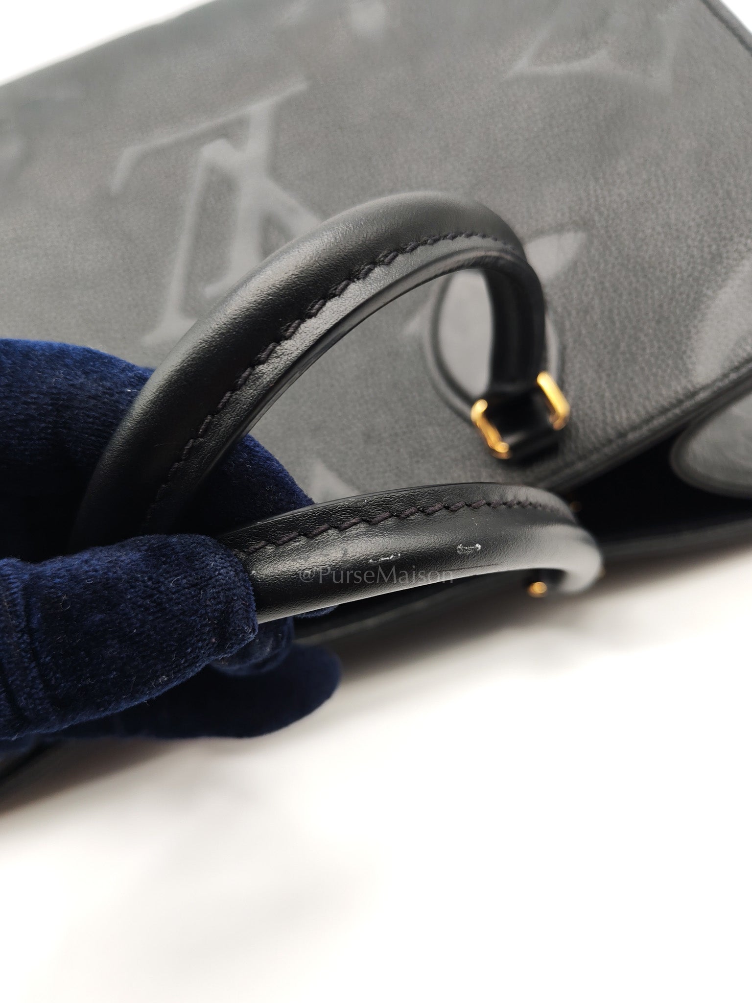 OnTheGo (OTG) MM in Black Monogram Empreinte Leather & Gold Hardware Microchip | Purse Maison Luxury Bags Shop