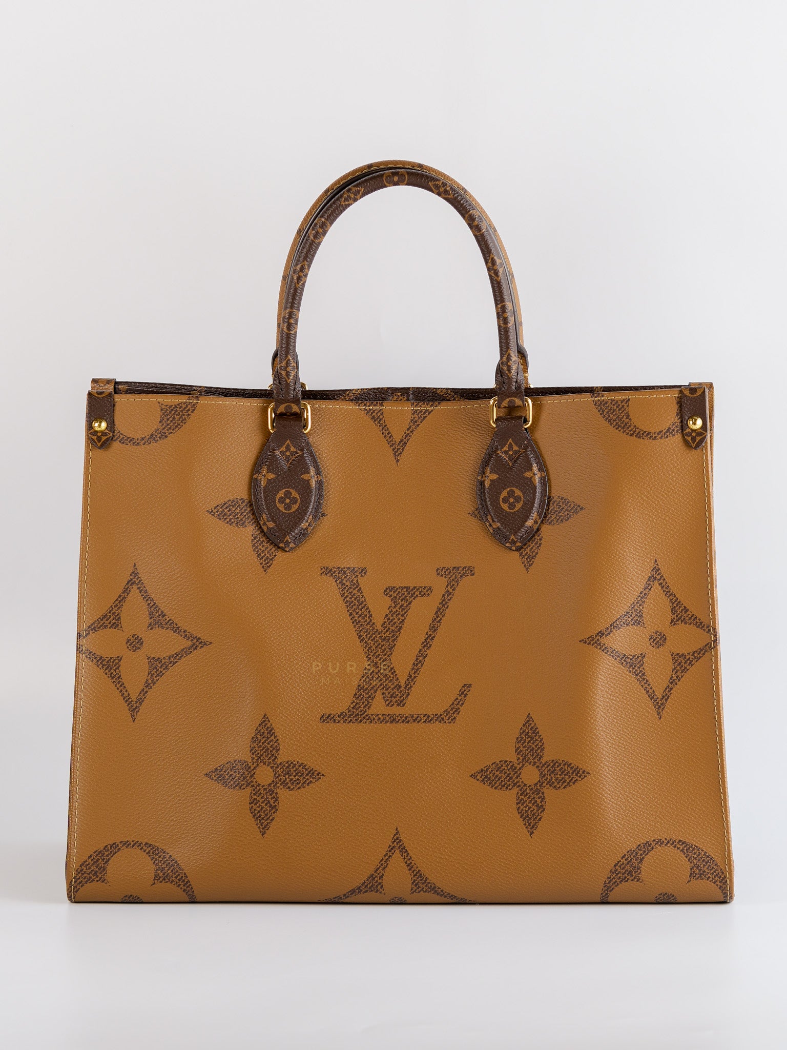 OnTheGo (OTG) MM in Reverse Monogram Canvas (Microchip) | Purse Maison Luxury Bags Shop