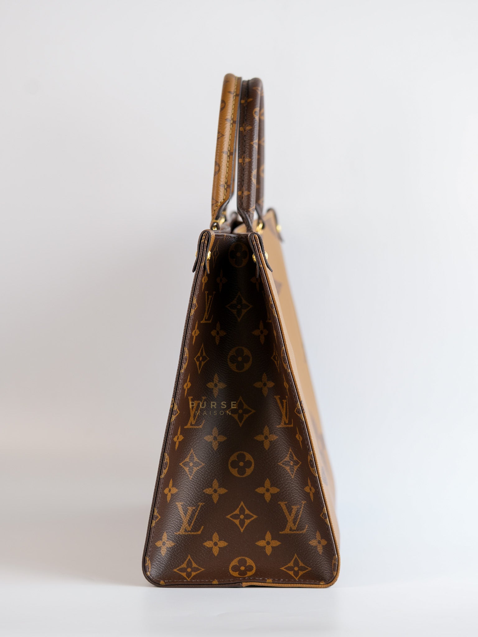OnTheGo (OTG) MM in Reverse Monogram Canvas (Microchip) | Purse Maison Luxury Bags Shop