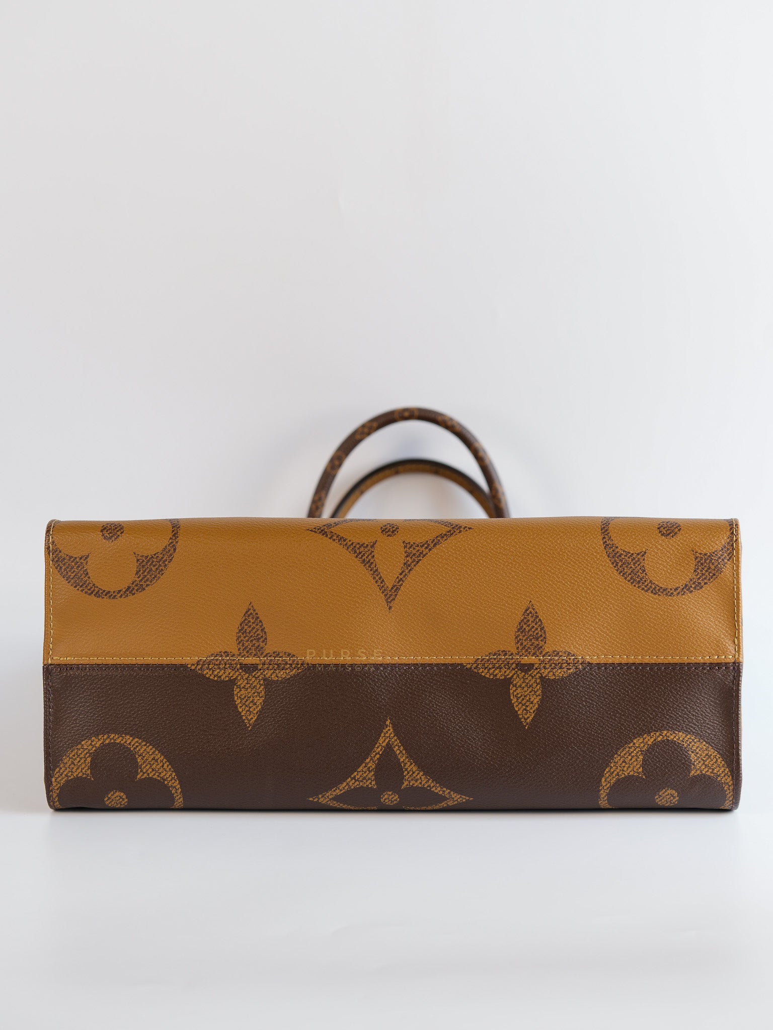 OnTheGo (OTG) MM in Reverse Monogram Canvas (Microchip) | Purse Maison Luxury Bags Shop
