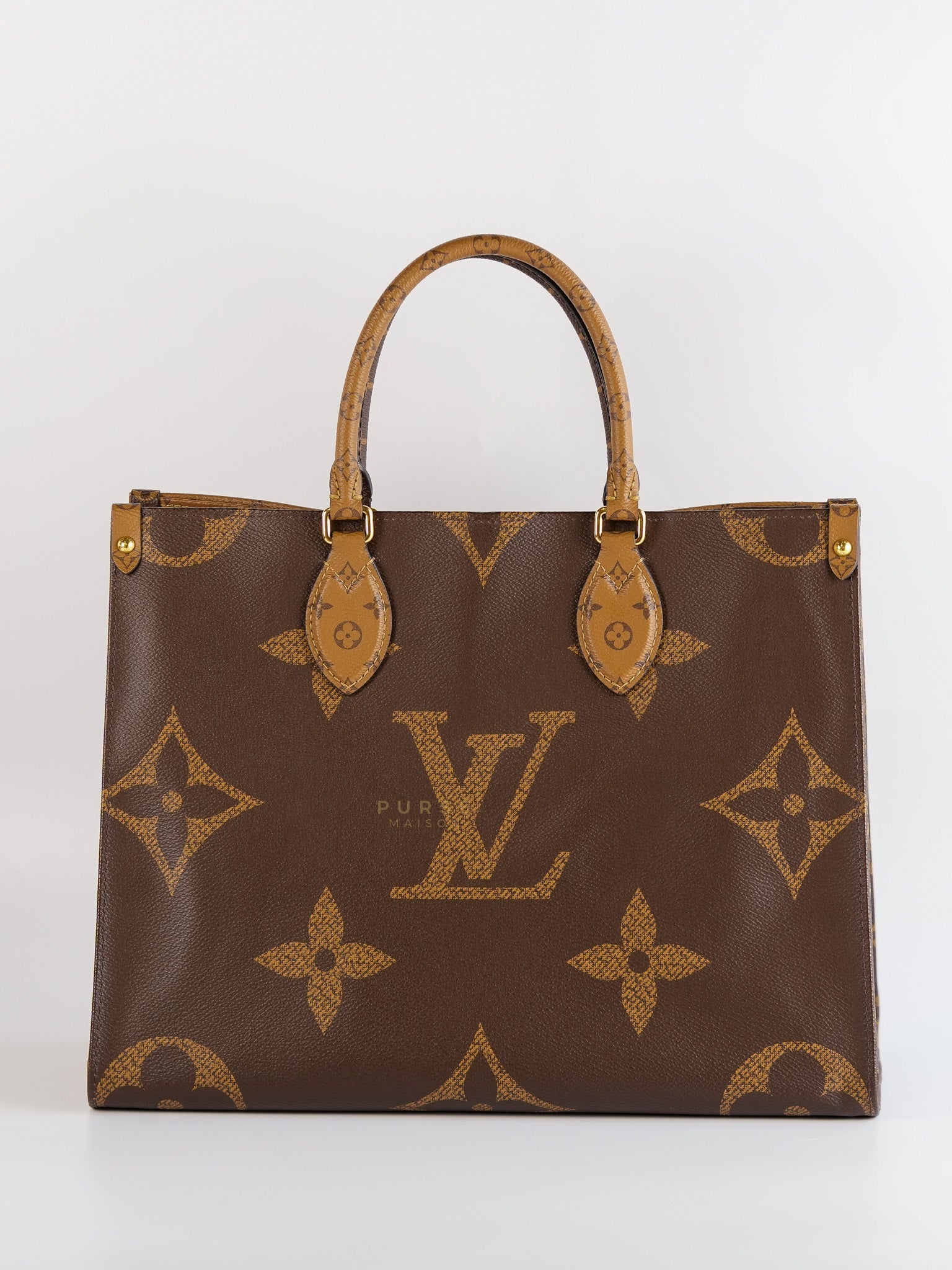 OnTheGo (OTG) MM in Reverse Monogram Canvas (Microchip) | Purse Maison Luxury Bags Shop