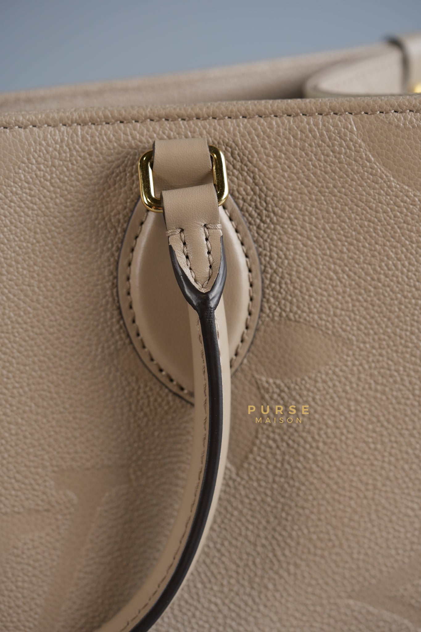 OnTheGo (OTG) MM Tourterelle Empreinte Monogram (Microchip) | Purse Maison Luxury Bags Shop