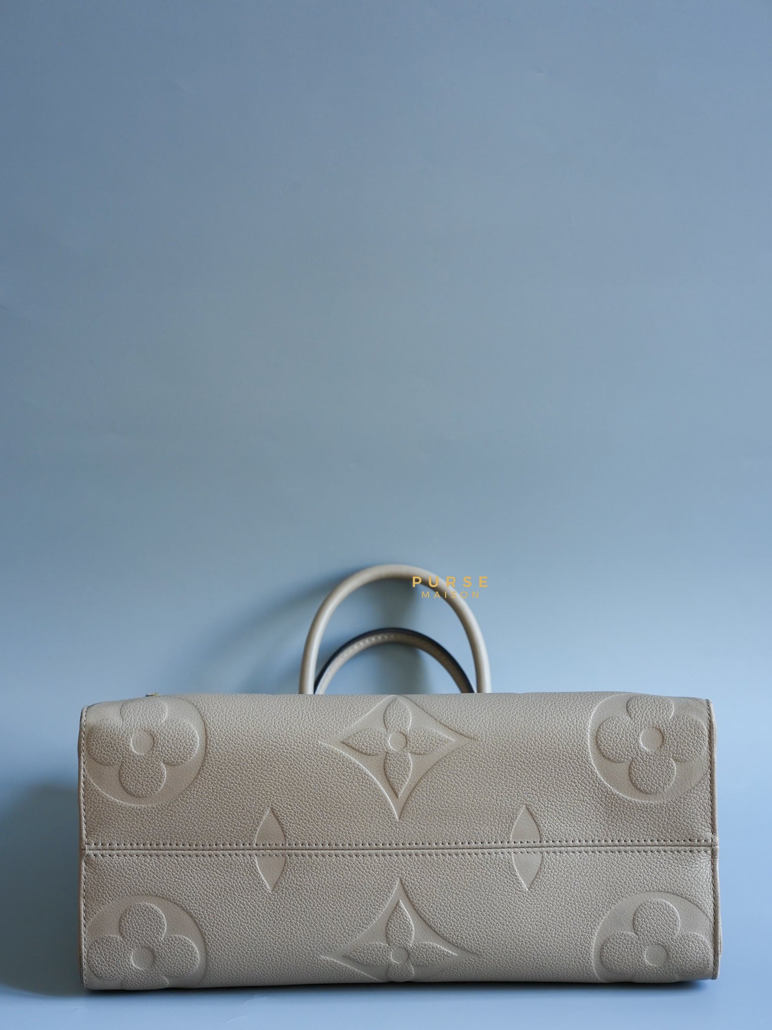 OnTheGo (OTG) MM Tourterelle Empreinte Monogram (Microchip) | Purse Maison Luxury Bags Shop