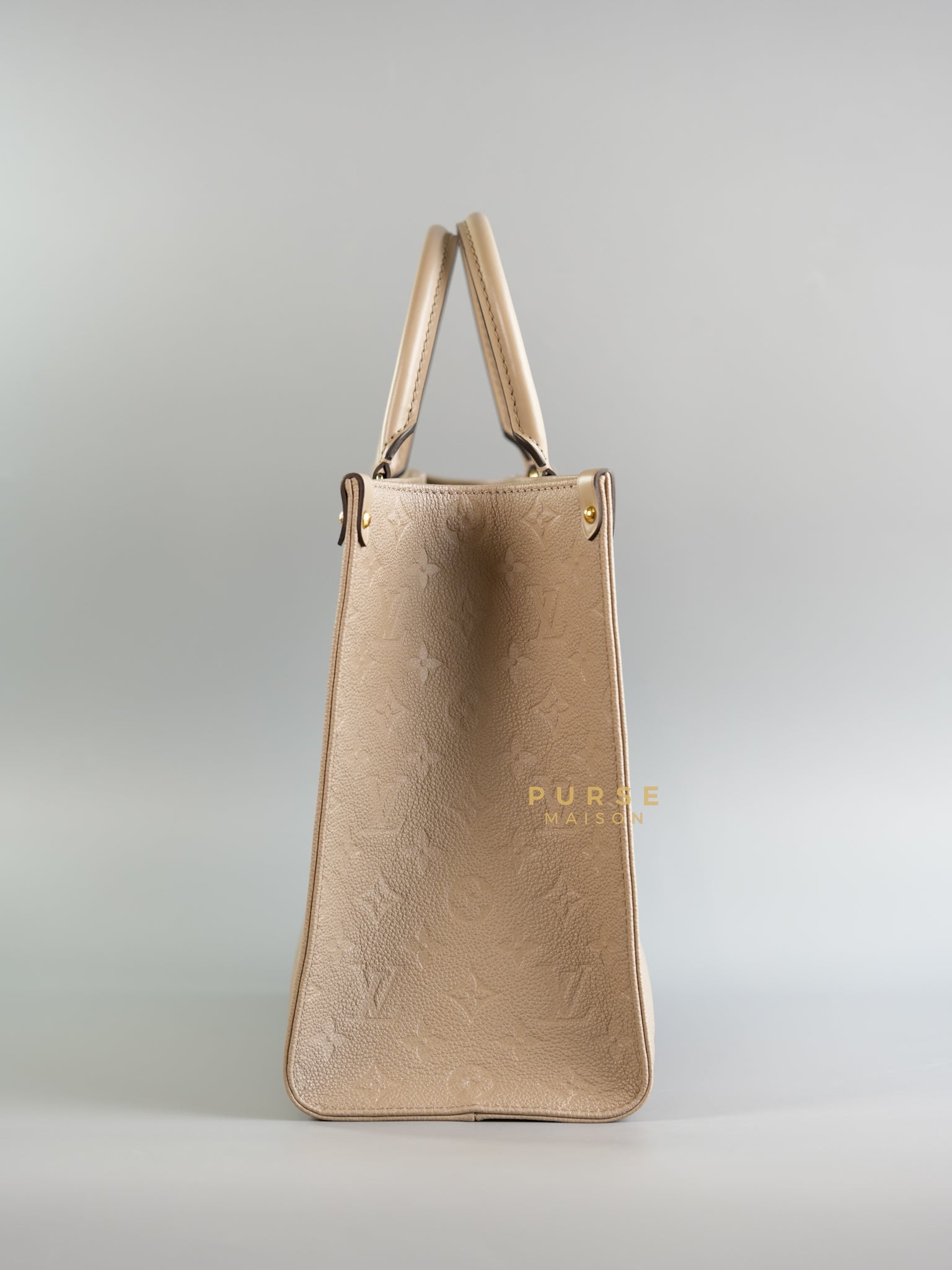 OnTheGo (OTG) MM Tourterelle Empreinte Monogram (Microchip) | Purse Maison Luxury Bags Shop